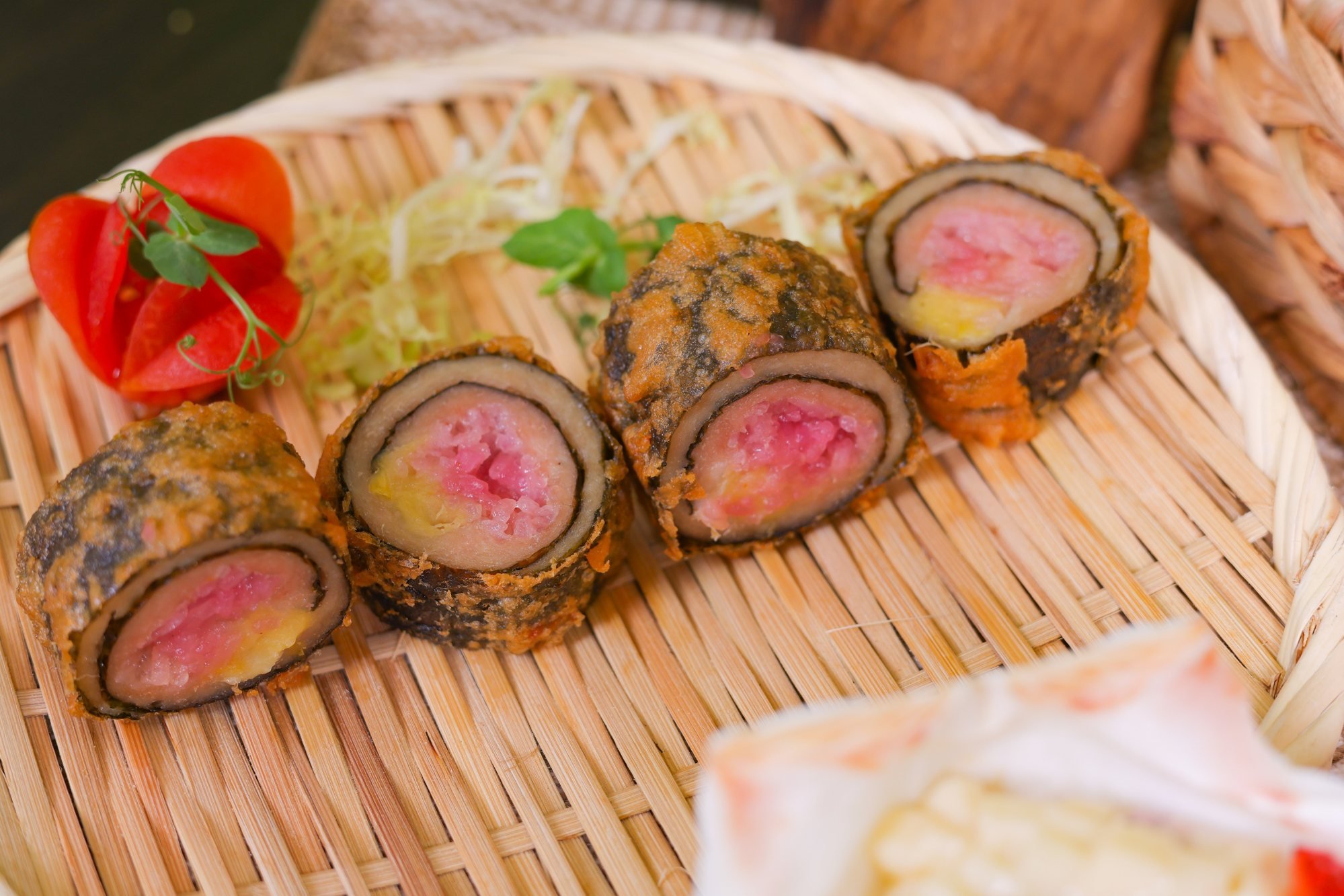 Deep-fried chicken rolls stuffed with durian and glutinous rice from Hotel Icon. Photo: Hotel Icon