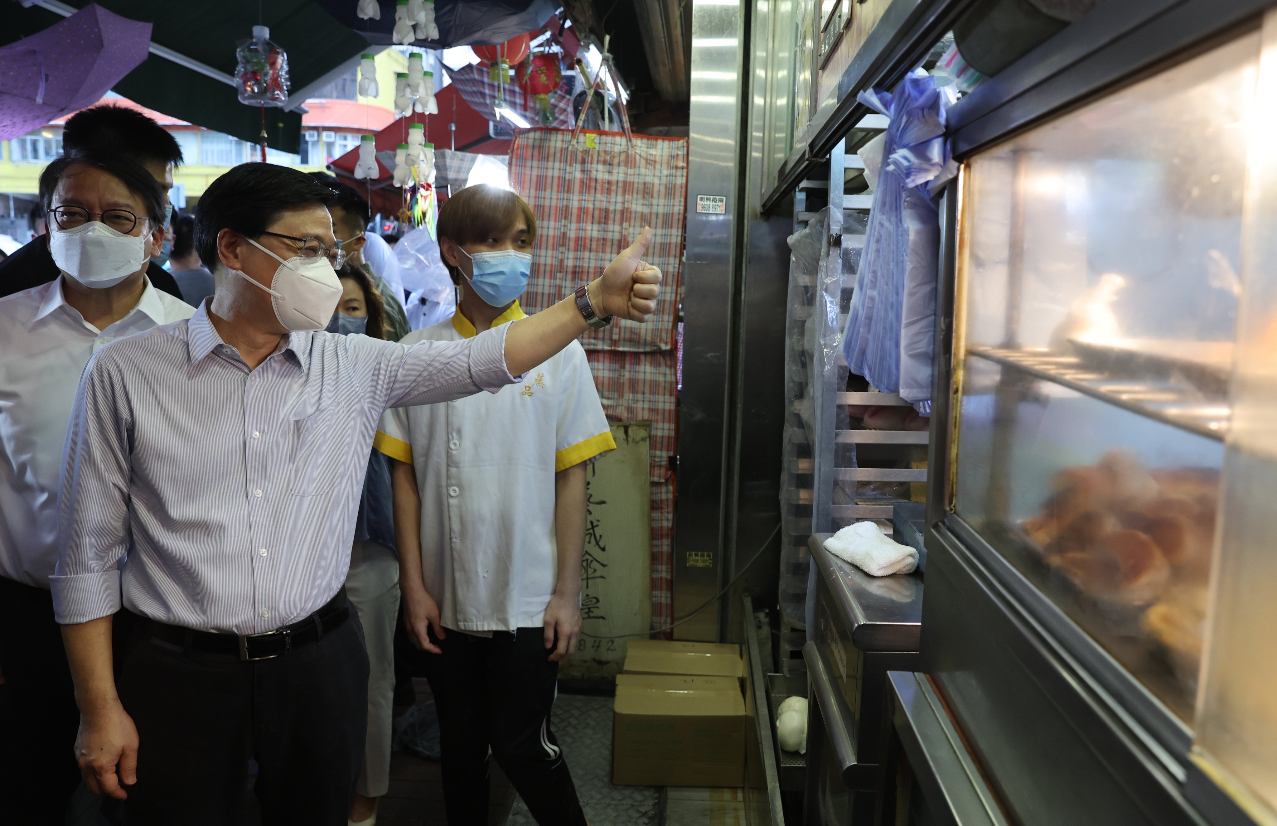 Chief executive John Lee visits businesses in Sham Shui Po on July 30.
Photo: Yik Yeung -man
