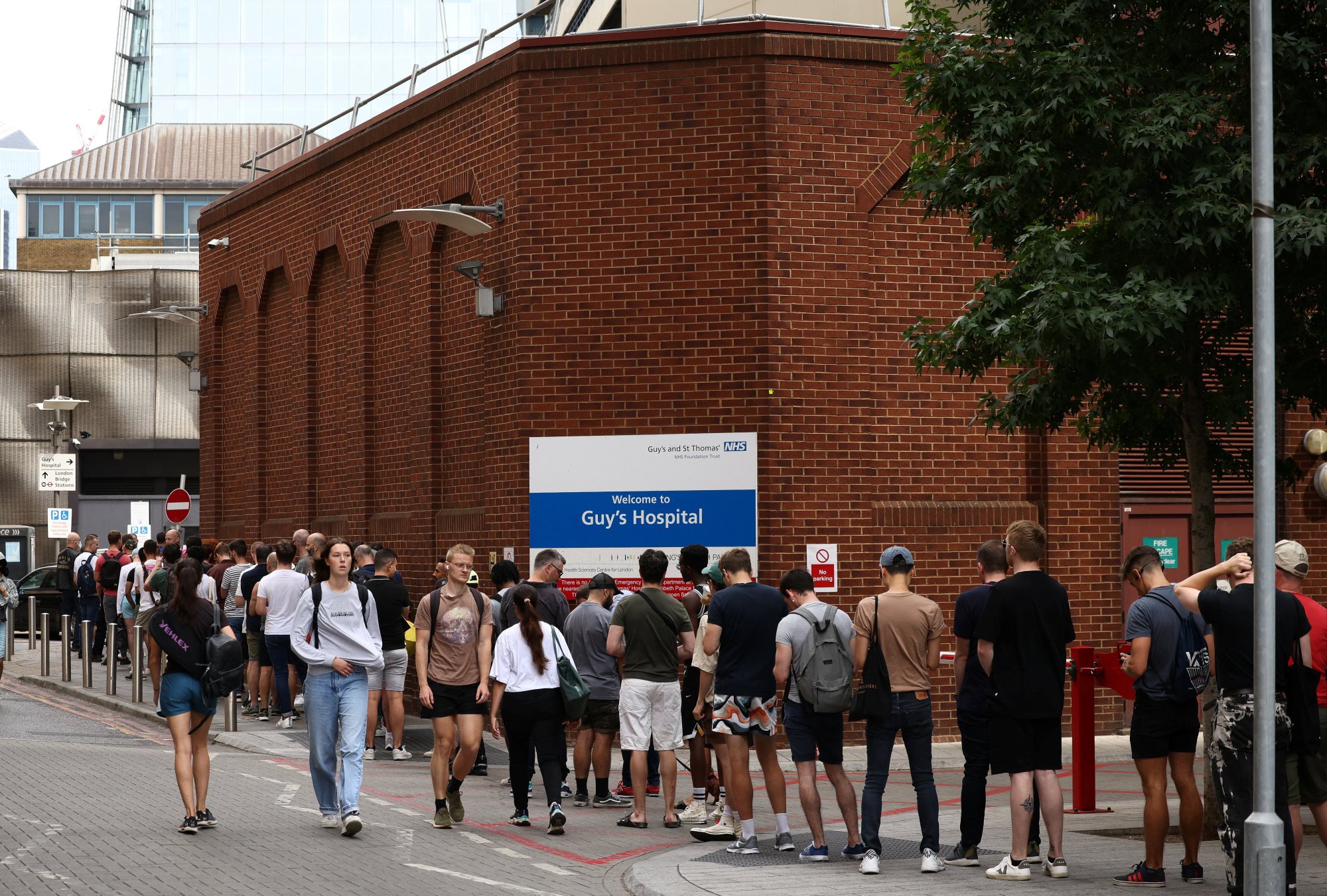 People queue up to receive monkeypox vaccinations at Guy’s Hospital in central London, Britain on Saturday. Photo: Reuters