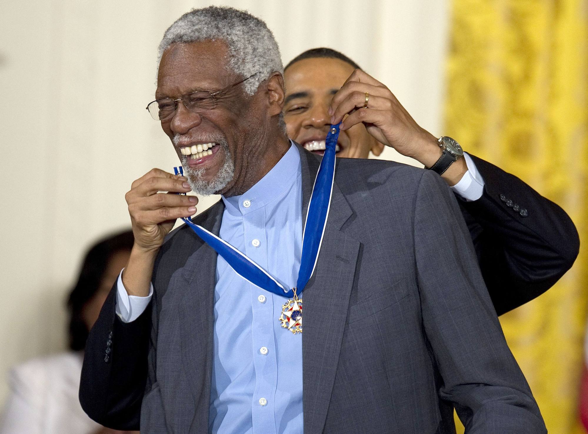 Former US President Barack Obama awards the 2010 Medal of Freedom to NBA basketball star and human rights advocate Bill Russell. Photo: AFP