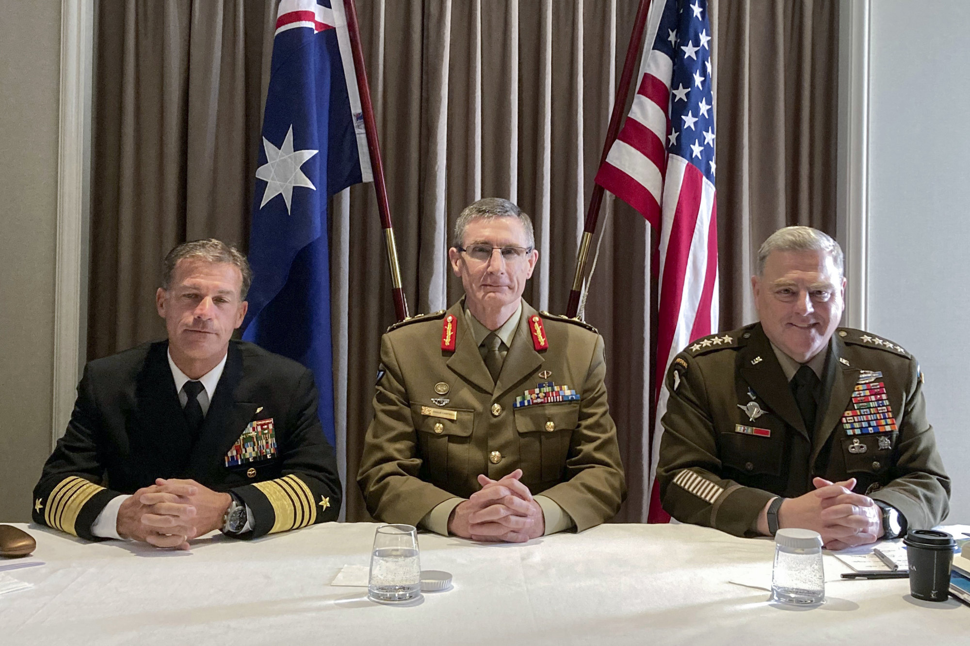 From left: Aquilino, Australia’s defence chief General Angus Campbell and US General Mark Milley pose for a photo in Sydney on Wednesday. Photo: AP