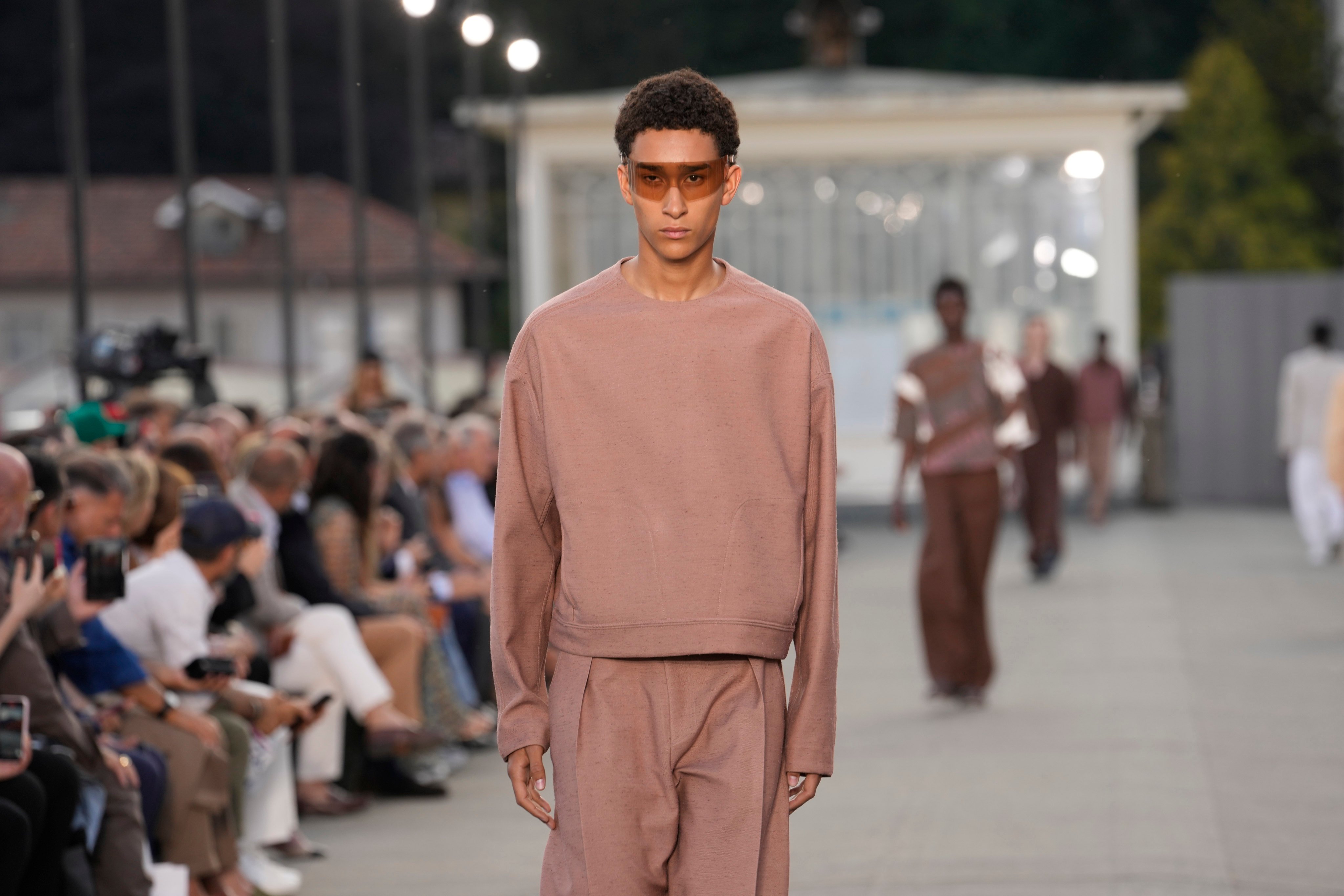 A model dons a head-to-toe neutral palette for Zegna men’s spring/summer 2023 collection presented in in Trivero, near Biella in northern Italy, on June 20. Photo: AP