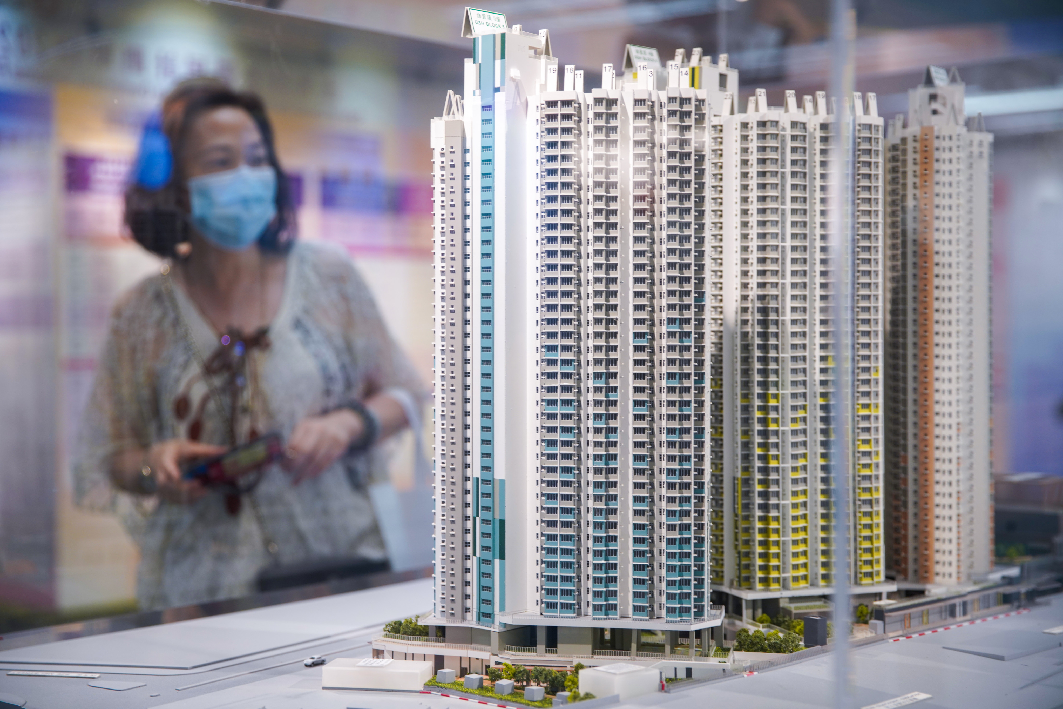 Potential buyers inspect a development of government-subsidised housing. Photo: Winson Wong
