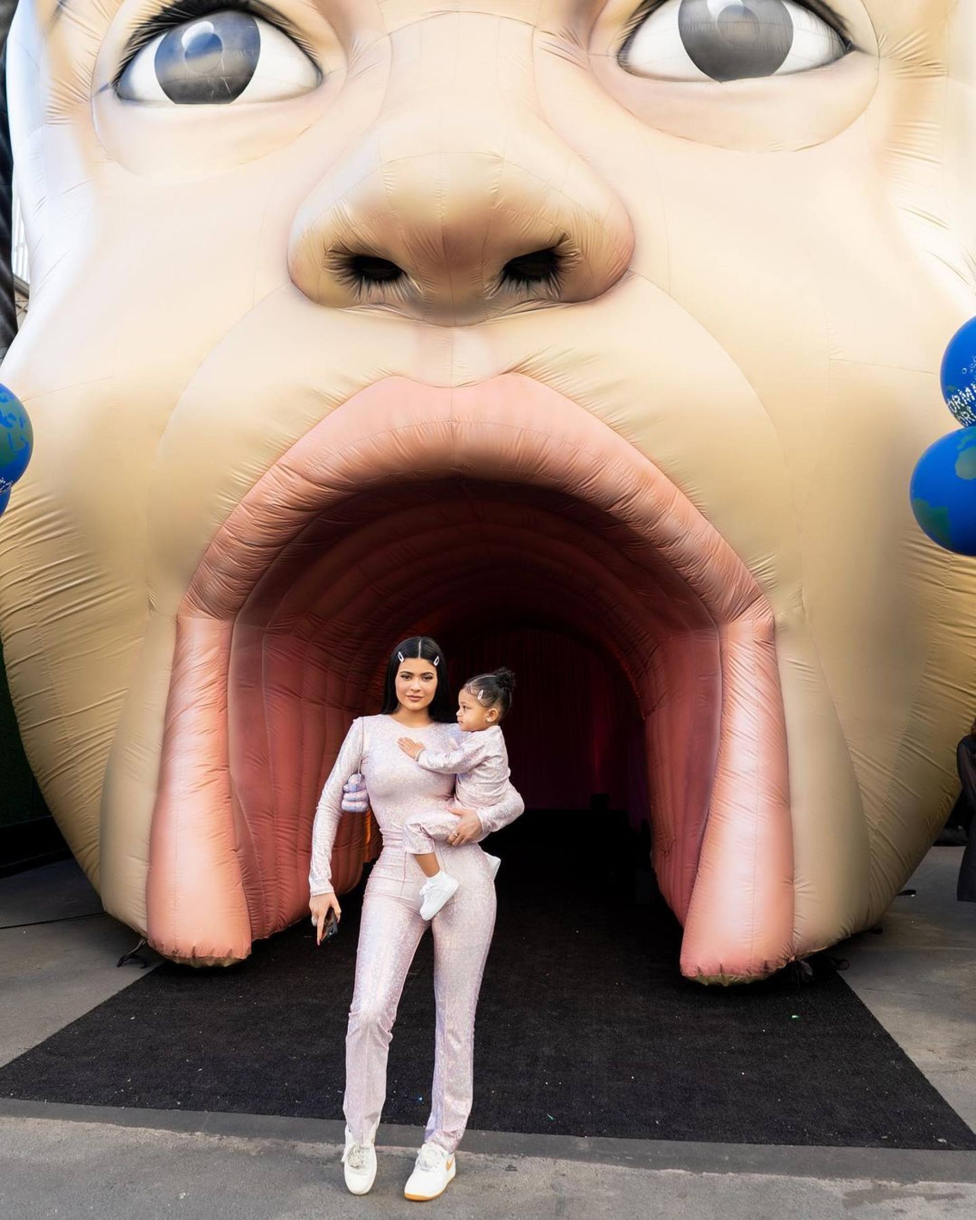 Kylie Jenner and Stormi at the inflatable Stormi head entrance. Photo: @kyliejenner/Instagram