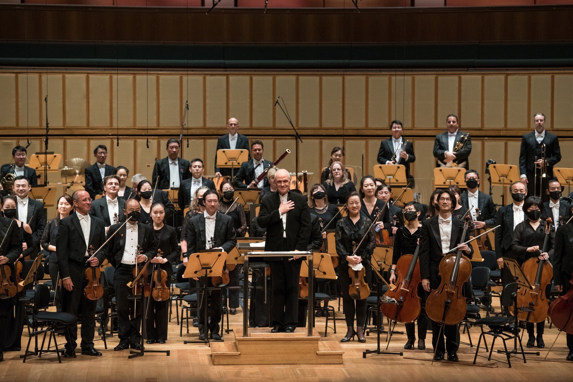 Hans Graf and the Singapore Symphony Orchestra receive the applause of the audience at the Esplanade Concert Hall on July 28 during his inaugural concert as music director. Photo: Singapore Symphony Orchestra