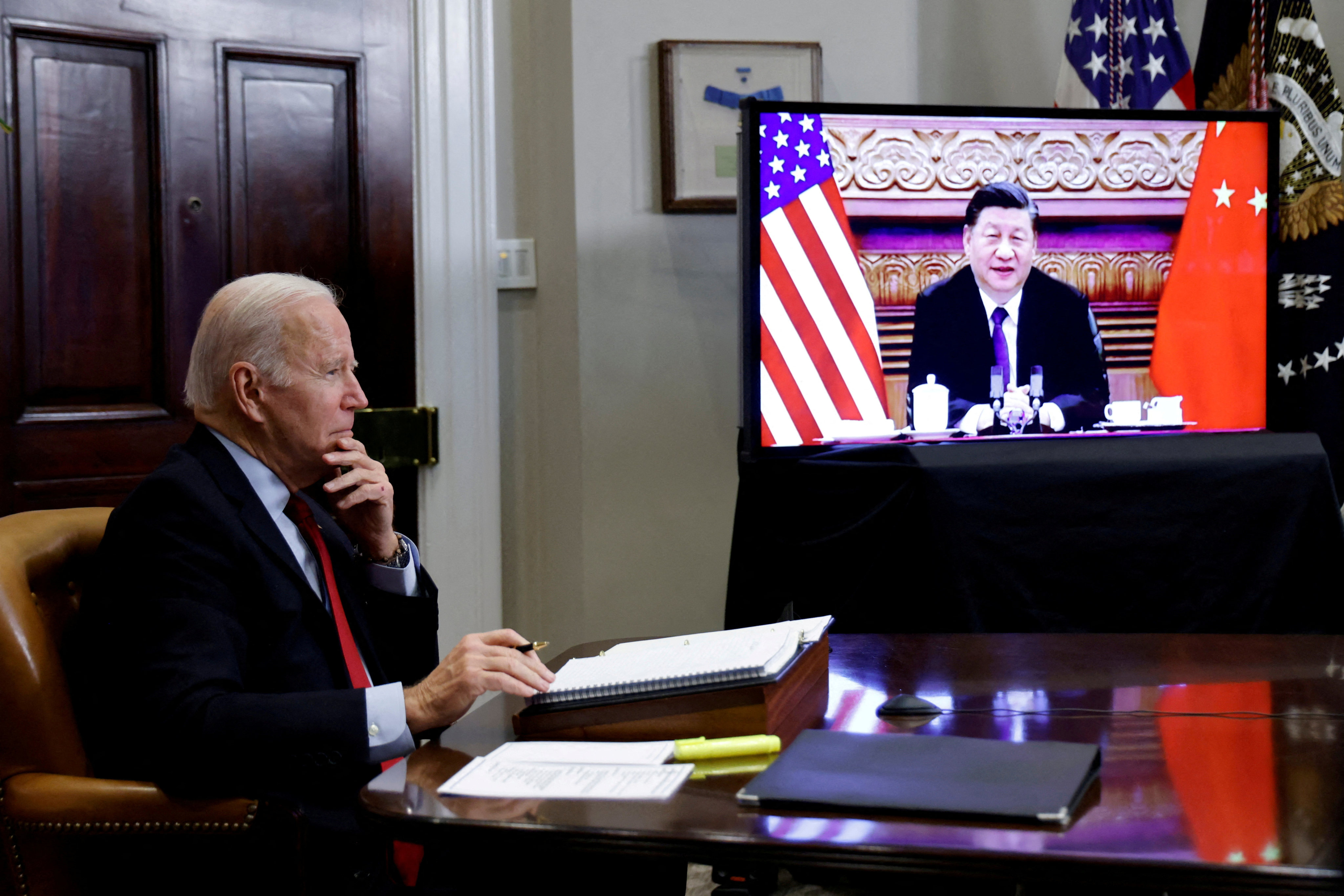 US President Joe Biden holds a virtual meeting with Chinese President Xi Jinping from the White House in Washington on November 15, 2021. Photo: Reuters