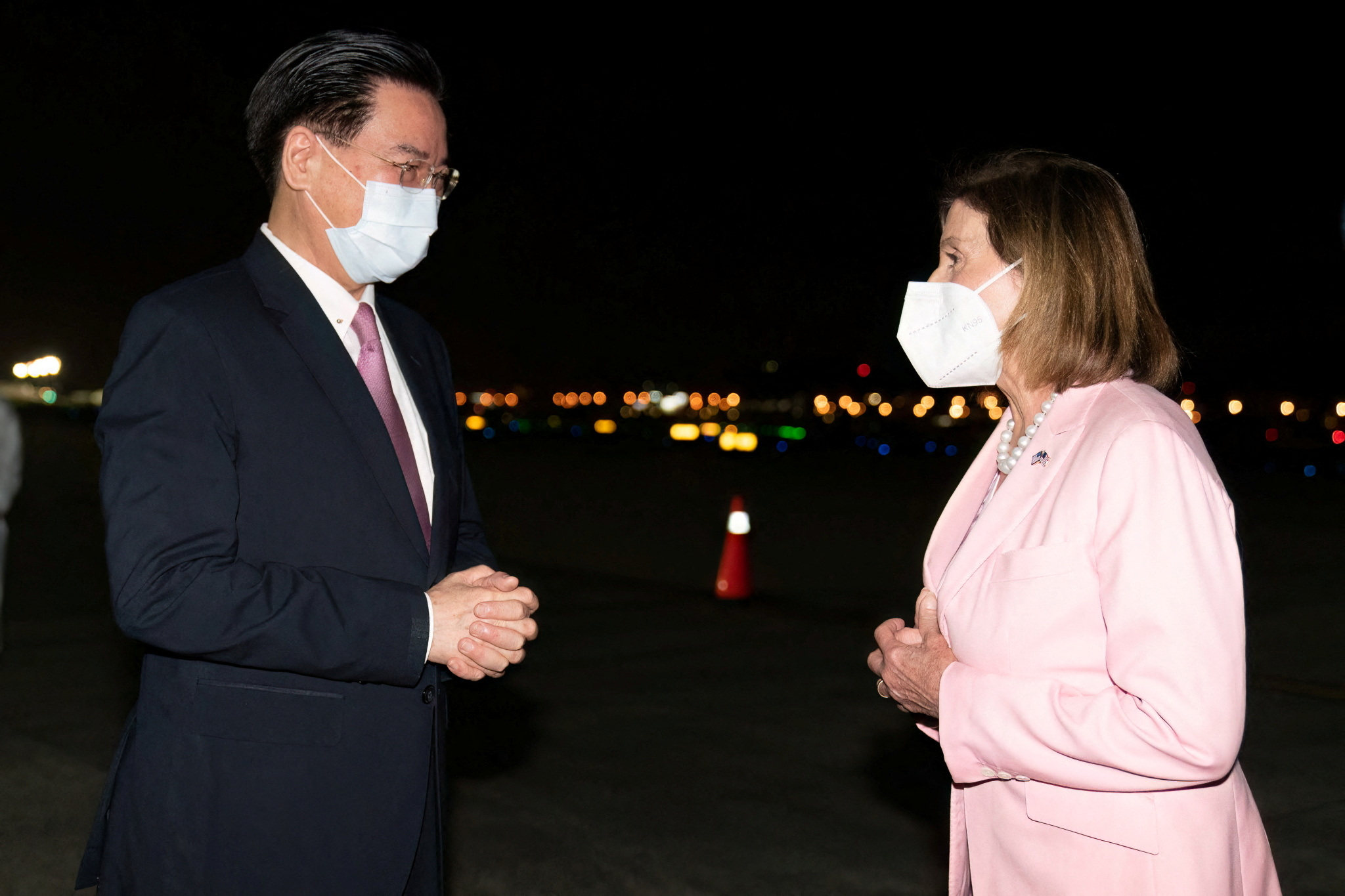 Taiwan Foreign Minister Joseph Wu welcomes US House Speaker Nancy Pelosi at Taipei Songshan Airport on Tuesday. Photo: Handout via Reuters