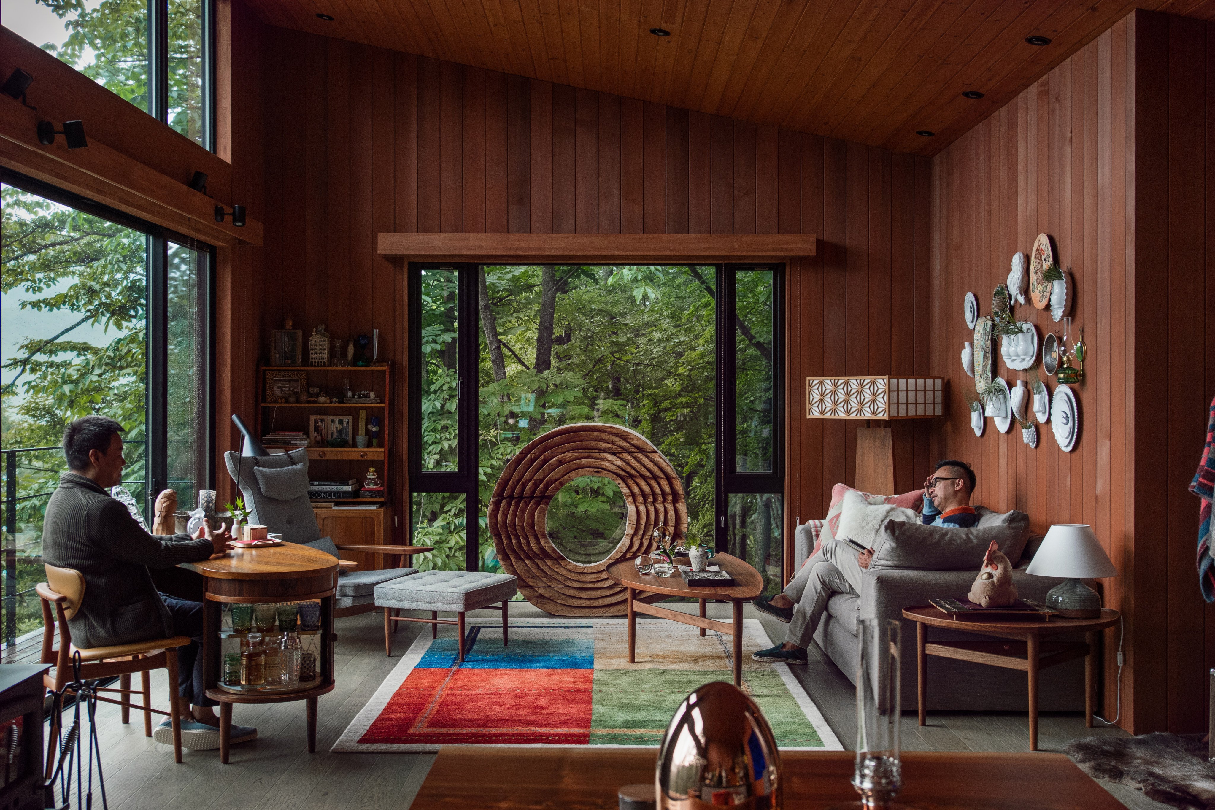 A holiday house in Karuizawa, Japan, of Ed Ng (on sofa) and Terence Ngan (at drinks table), of AB Concept. Photo: Reylia Slaby