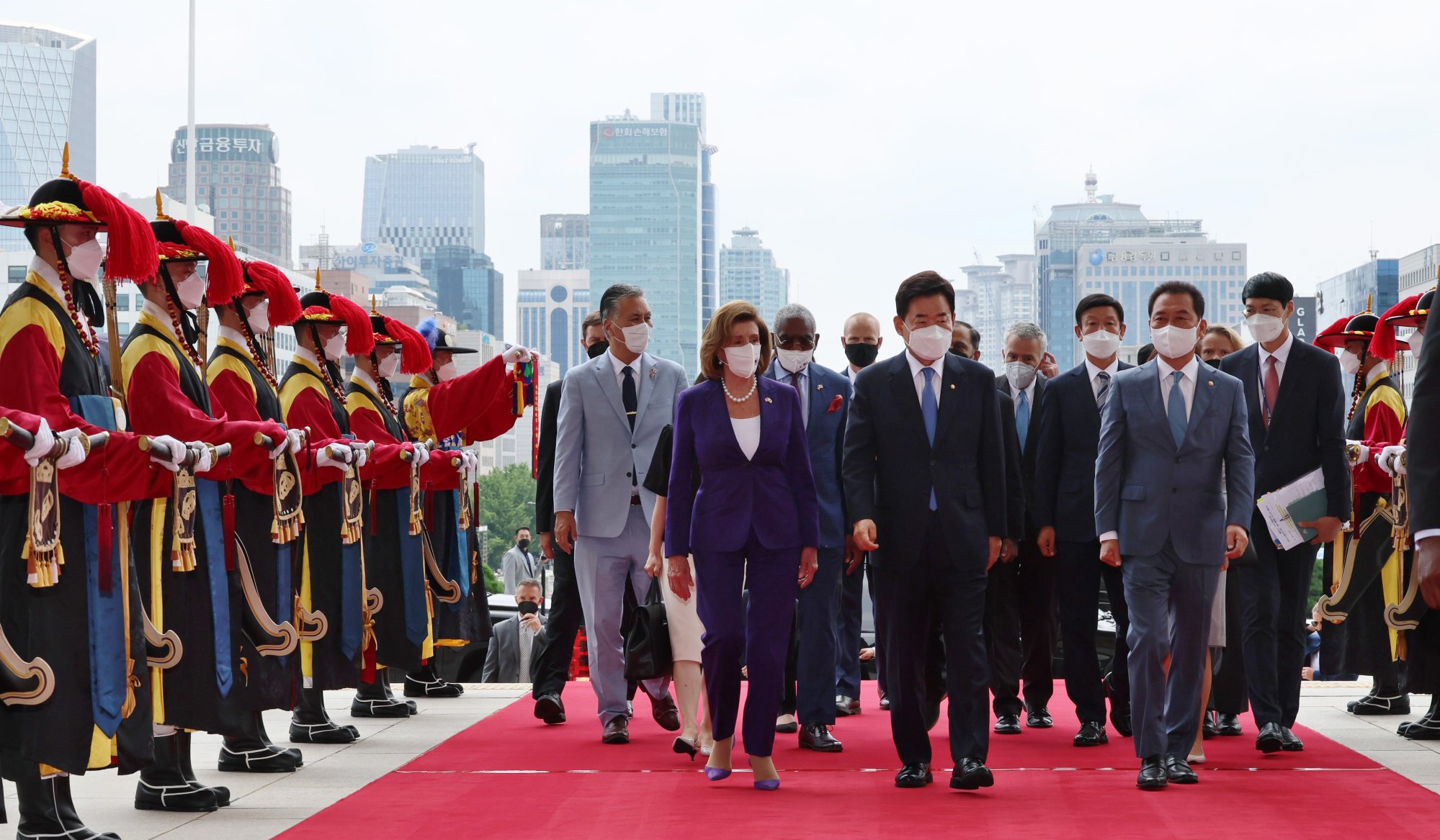 US House Speaker Nancy Pelosi (left), accompanied by South Korean National Assembly Speaker Kim Jin-pyo (centre), inspects an honour guard as she arrives at the National Assembly in Seoul. Photo: dpa