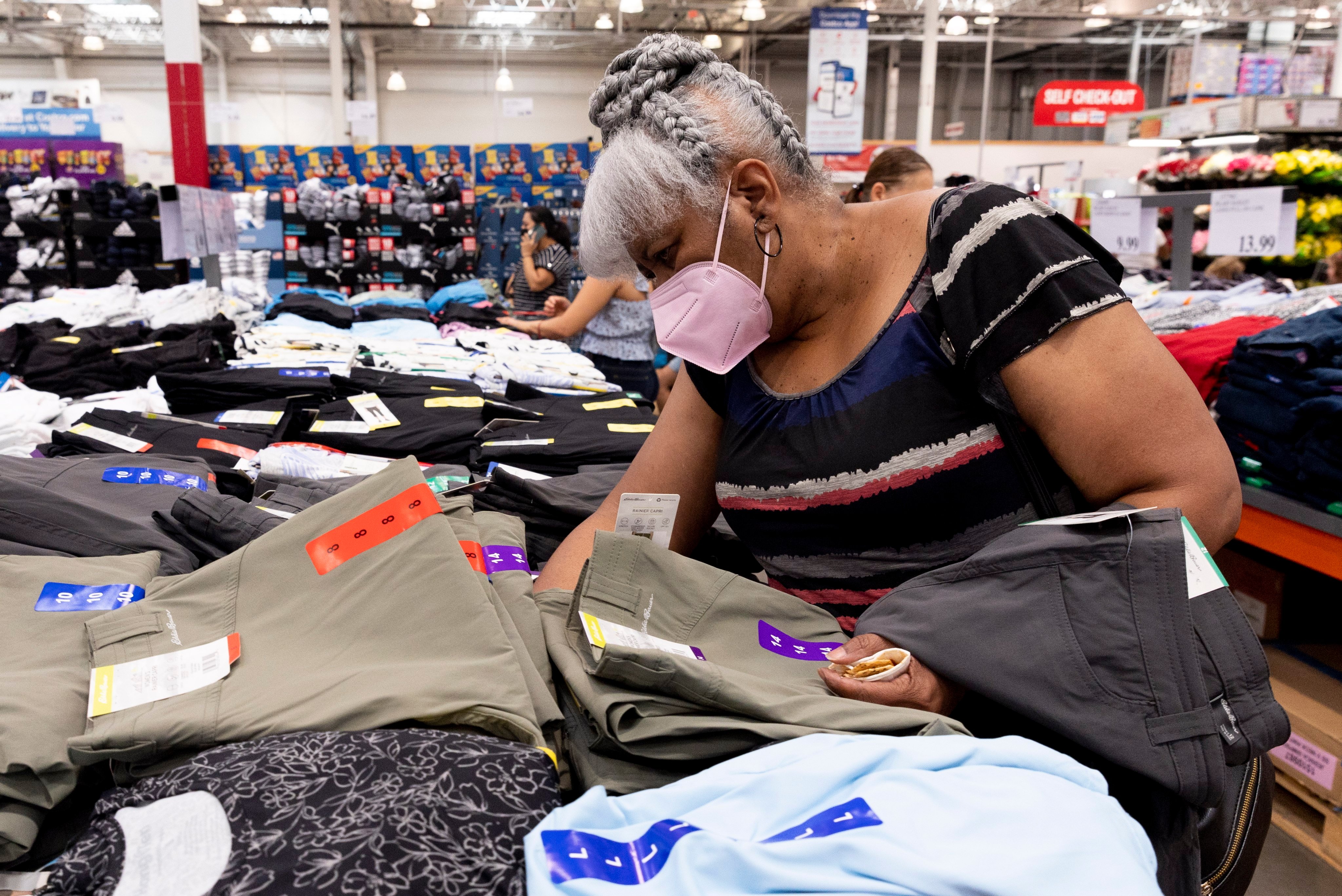 Customers look at clothing, some of which is produced in China, at a Costco store in Washington on July 6. Consumers are likely to shift spending back to services from goods and there are already signs of export growth decelerating in Asia. Photo: EPA-EFE