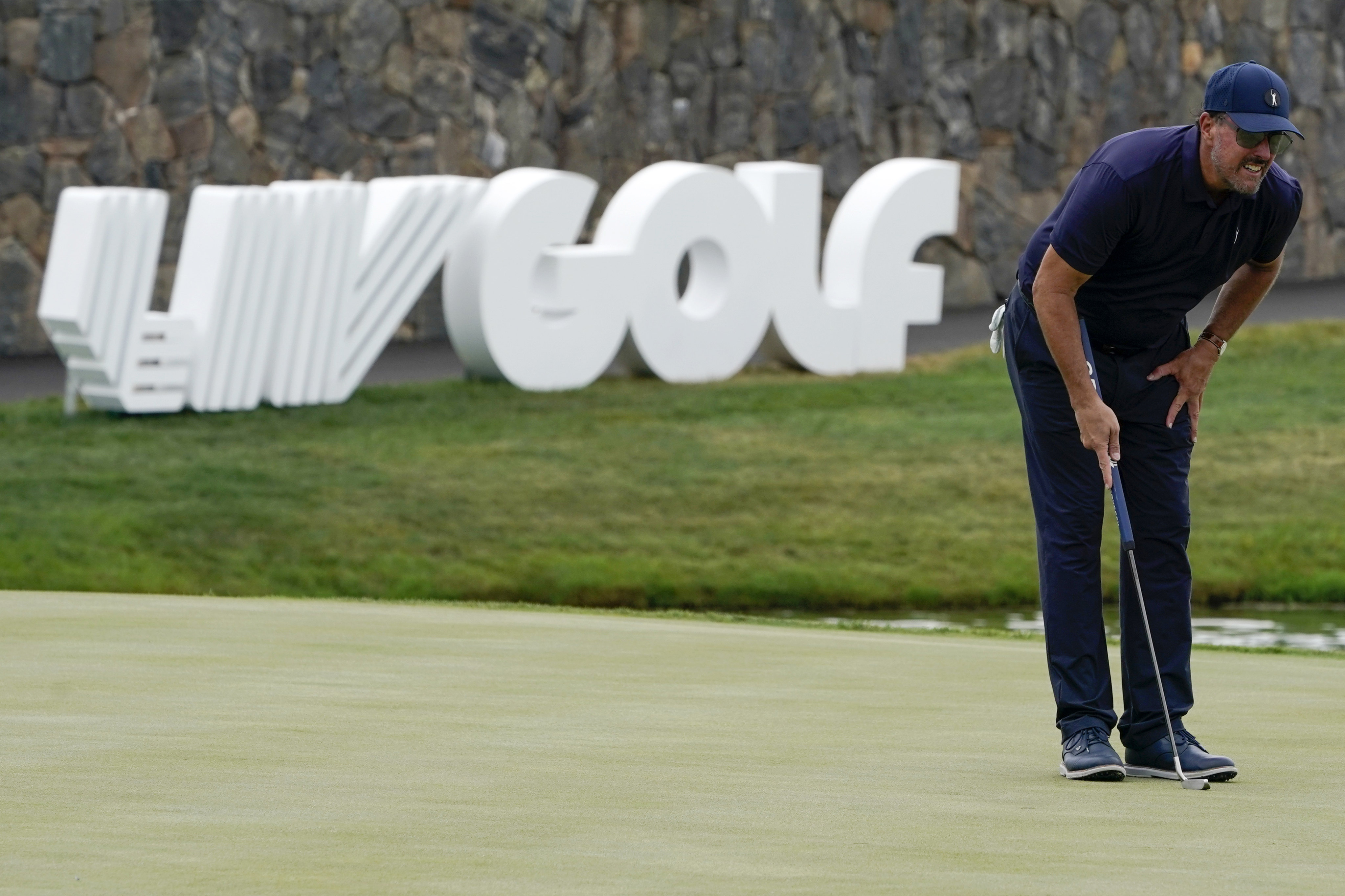 Phil Mickelson lines up a shot during the first round of the Bedminster Invitational LIV Golf tournament. Photo: AP