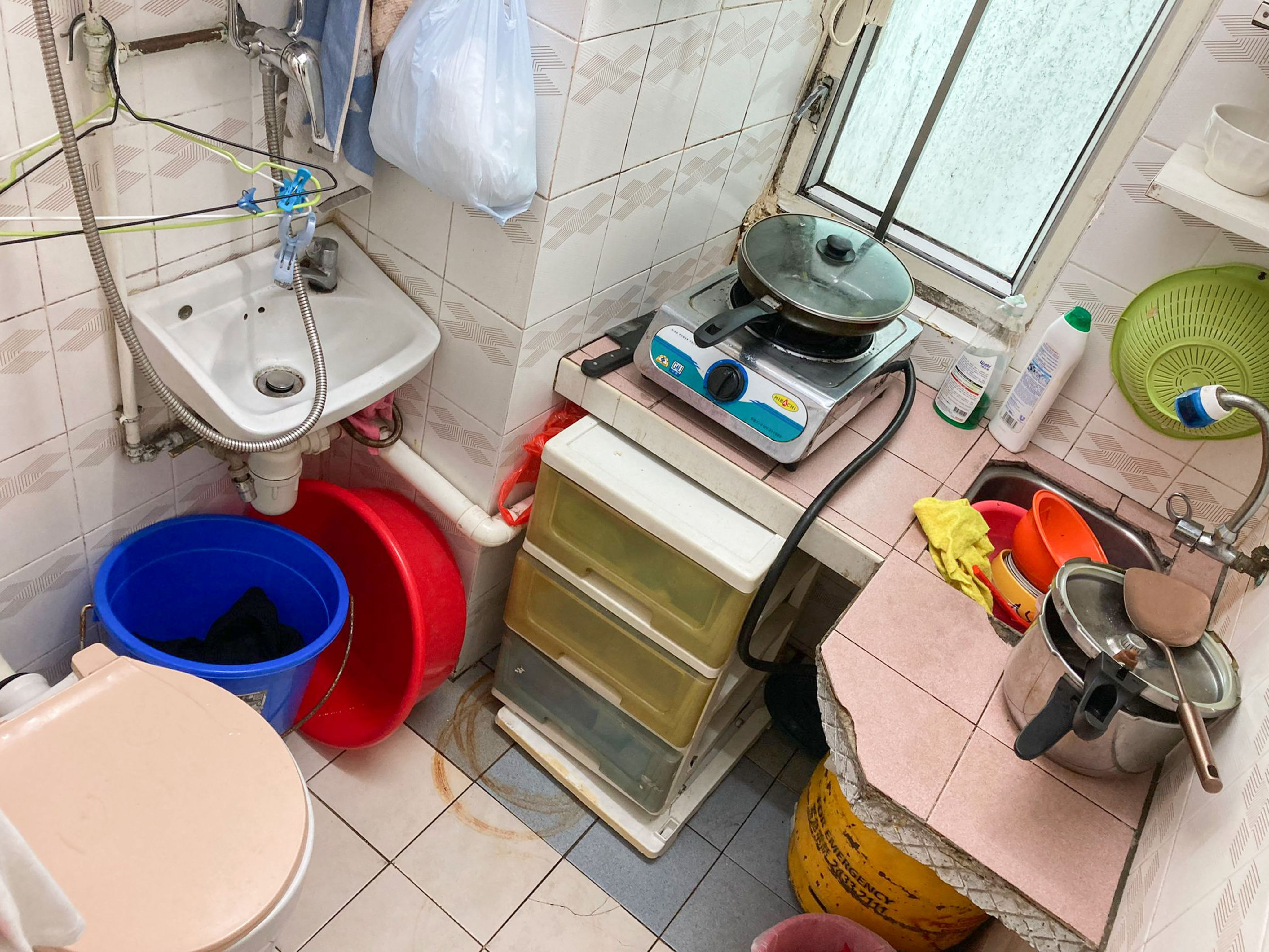 A combined kitchen and toilet in a subdivided flat in Kwai Chung. Photo: Handout