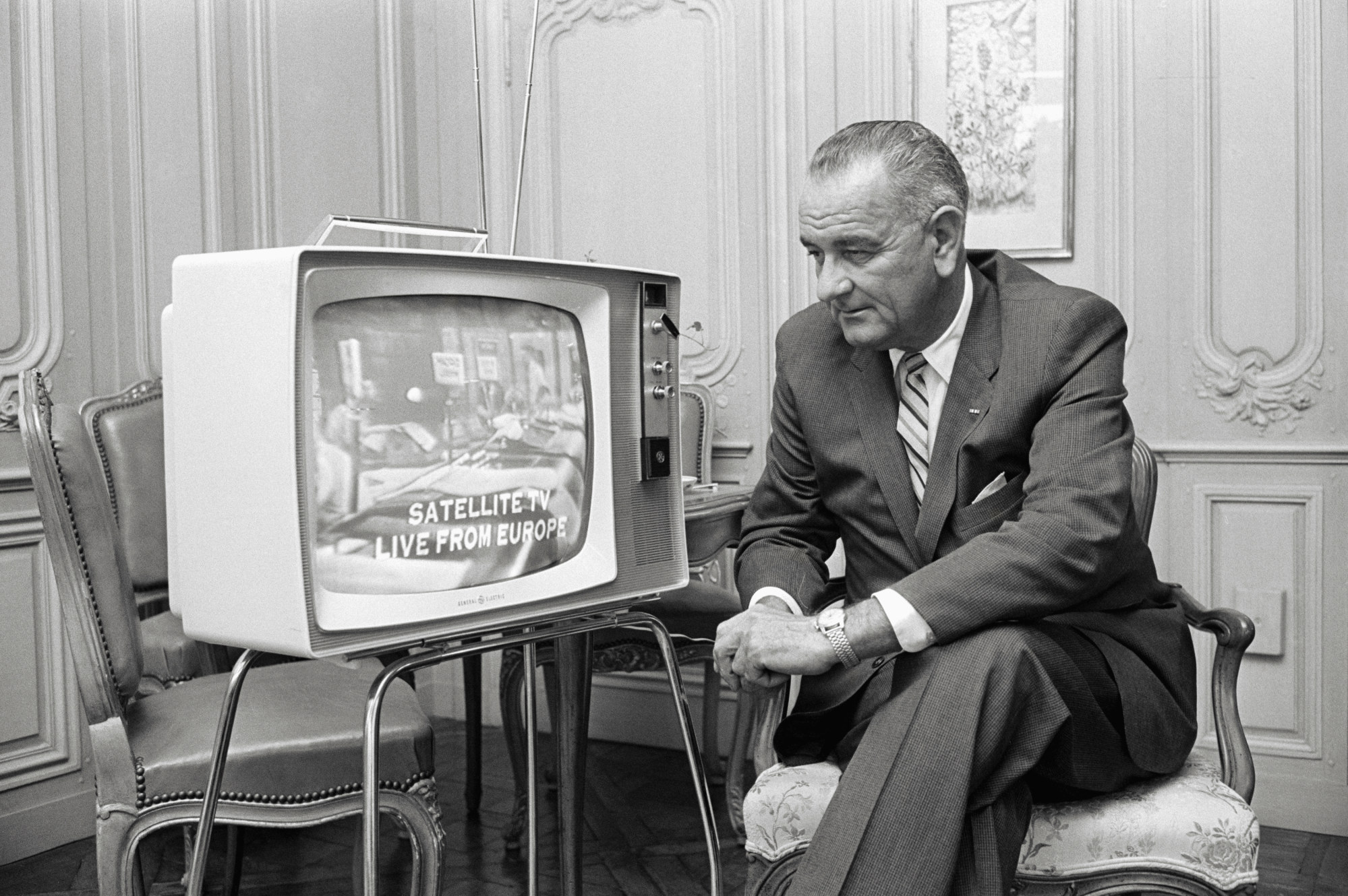 Then-US vice-president Lyndon Johnson watches the satellite-beamed Eurovision television broadcast at his home in 1962. Photo: Getty Images