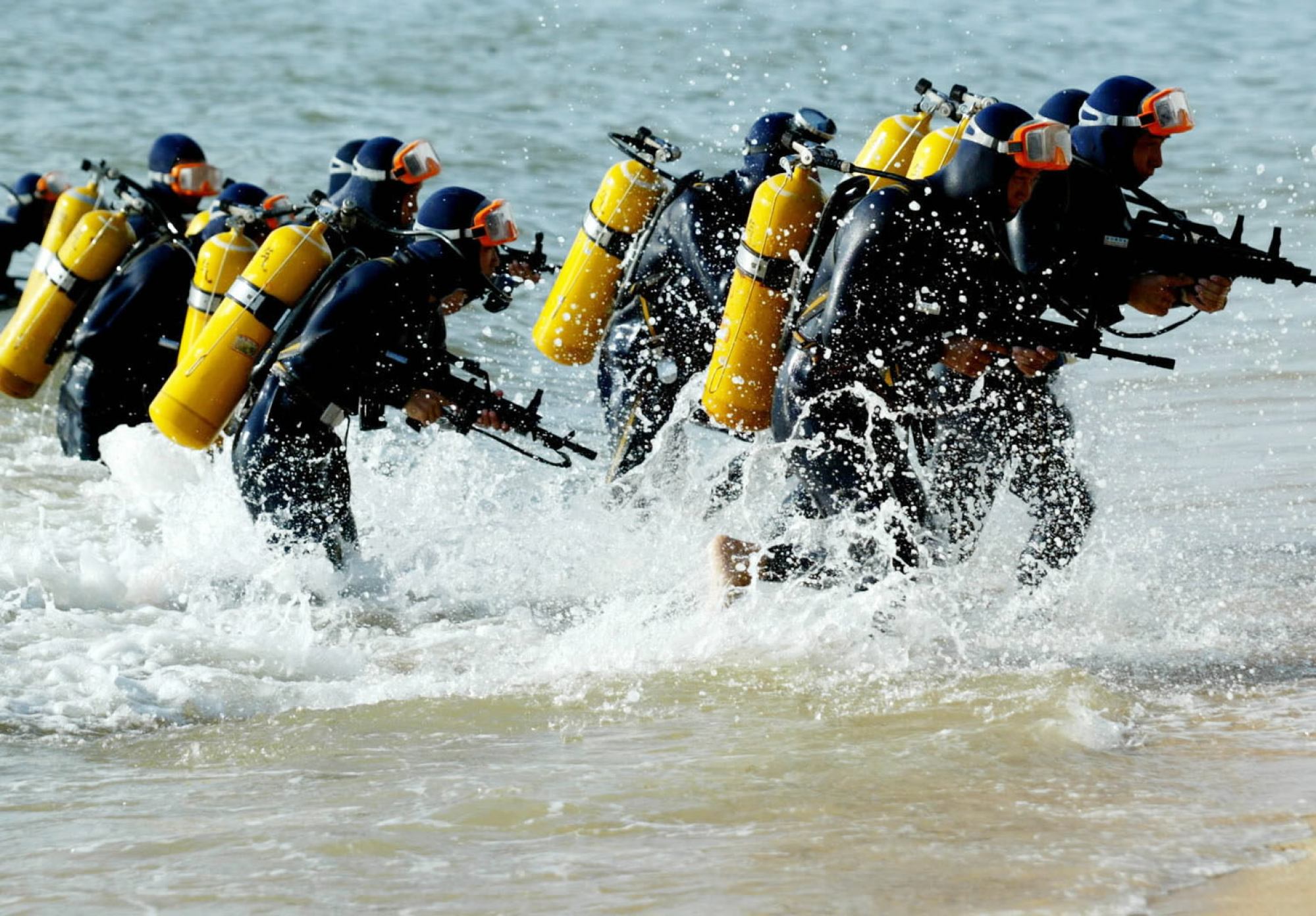 PLA marine corps frogmen train on a beach in Leizhou, Guangdong province. Photo: Xinhua