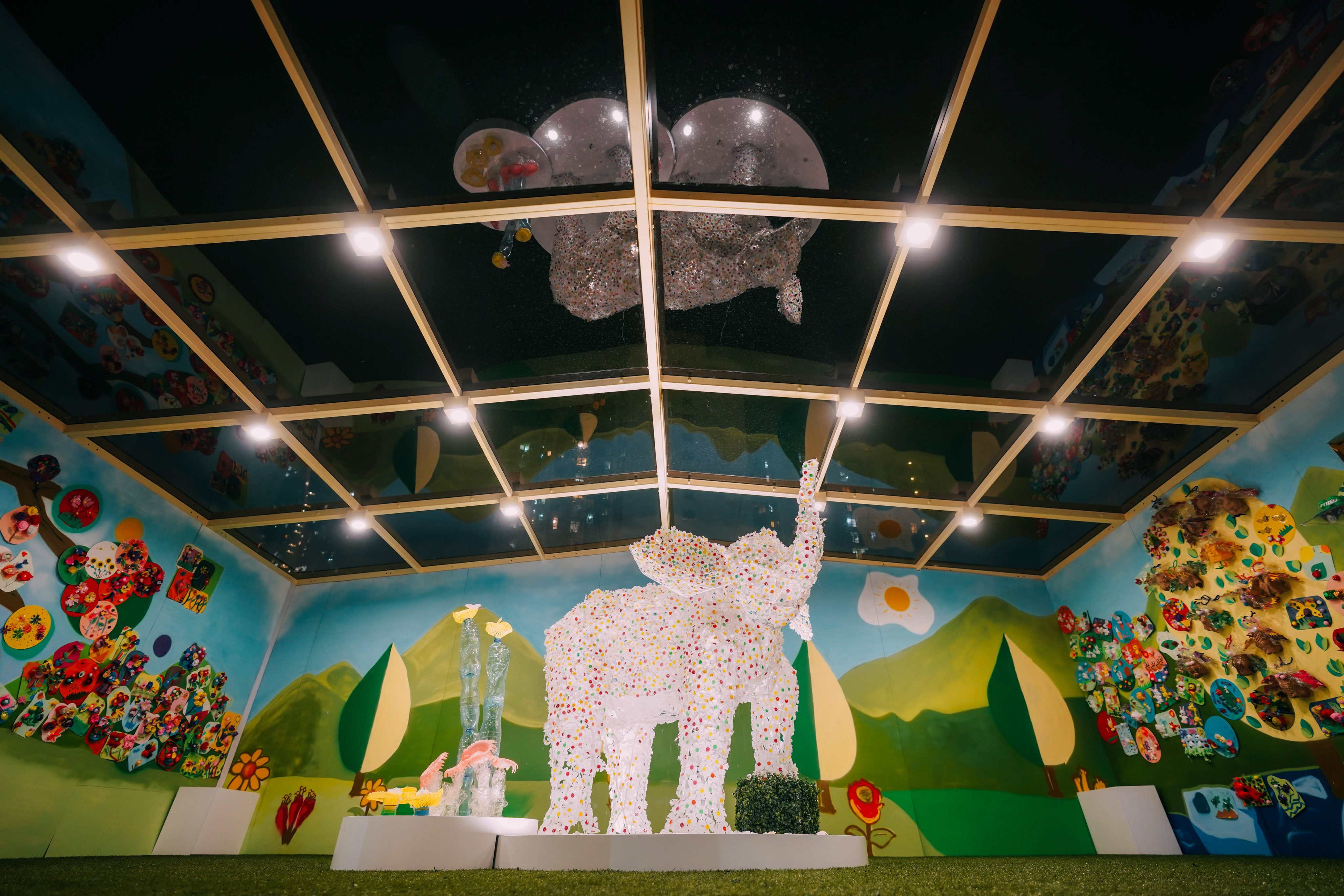 Artist Agnes Pang’s elephant made from used plastic egg boxes is shown together with eco-art creations by local students at the Tze Wan Shan Shopping Centre