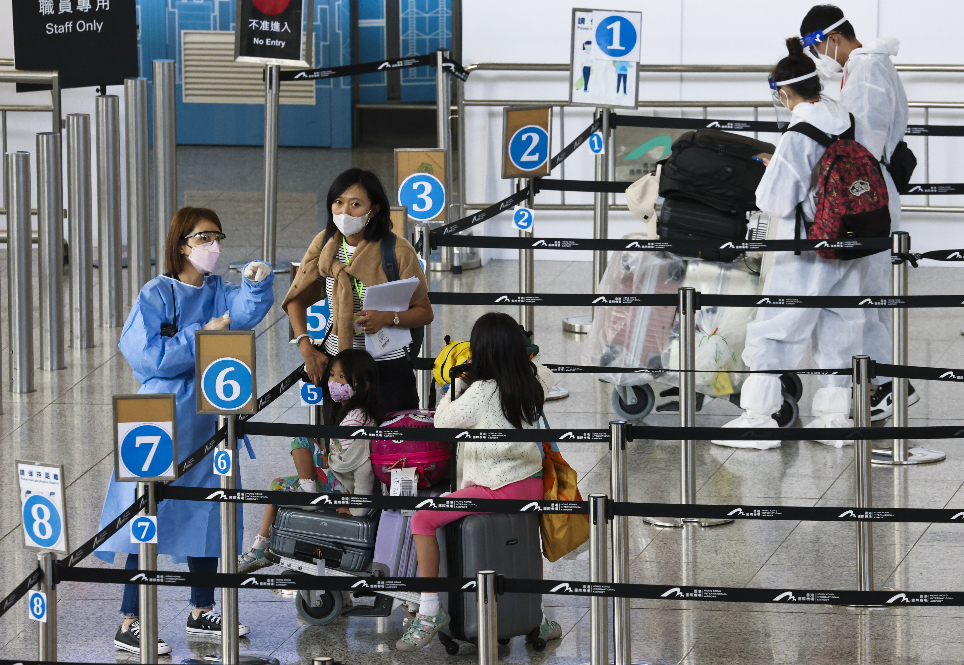 Young Hongkongers say easing of quarantine rules will make it easier to visit relatives and return to school or work. Photo: K. Y. Cheng