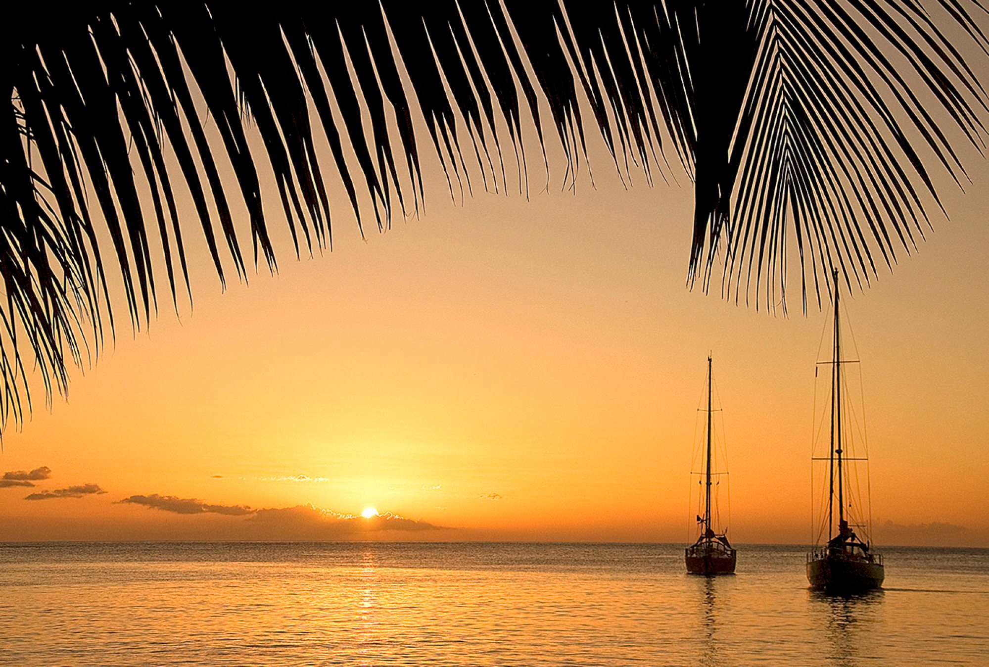 The sun setting in the Dominica. Photo: Shutterstock