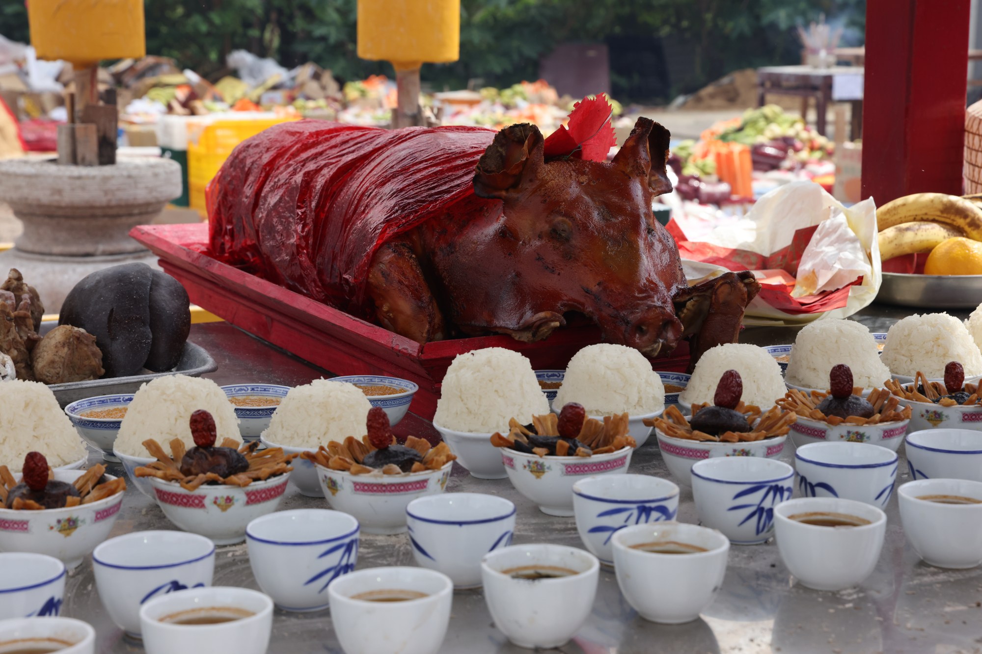 Lavish food offerings for spirits of the deceased are common at the Hungry Ghost Festival. Photo: Nora Tam