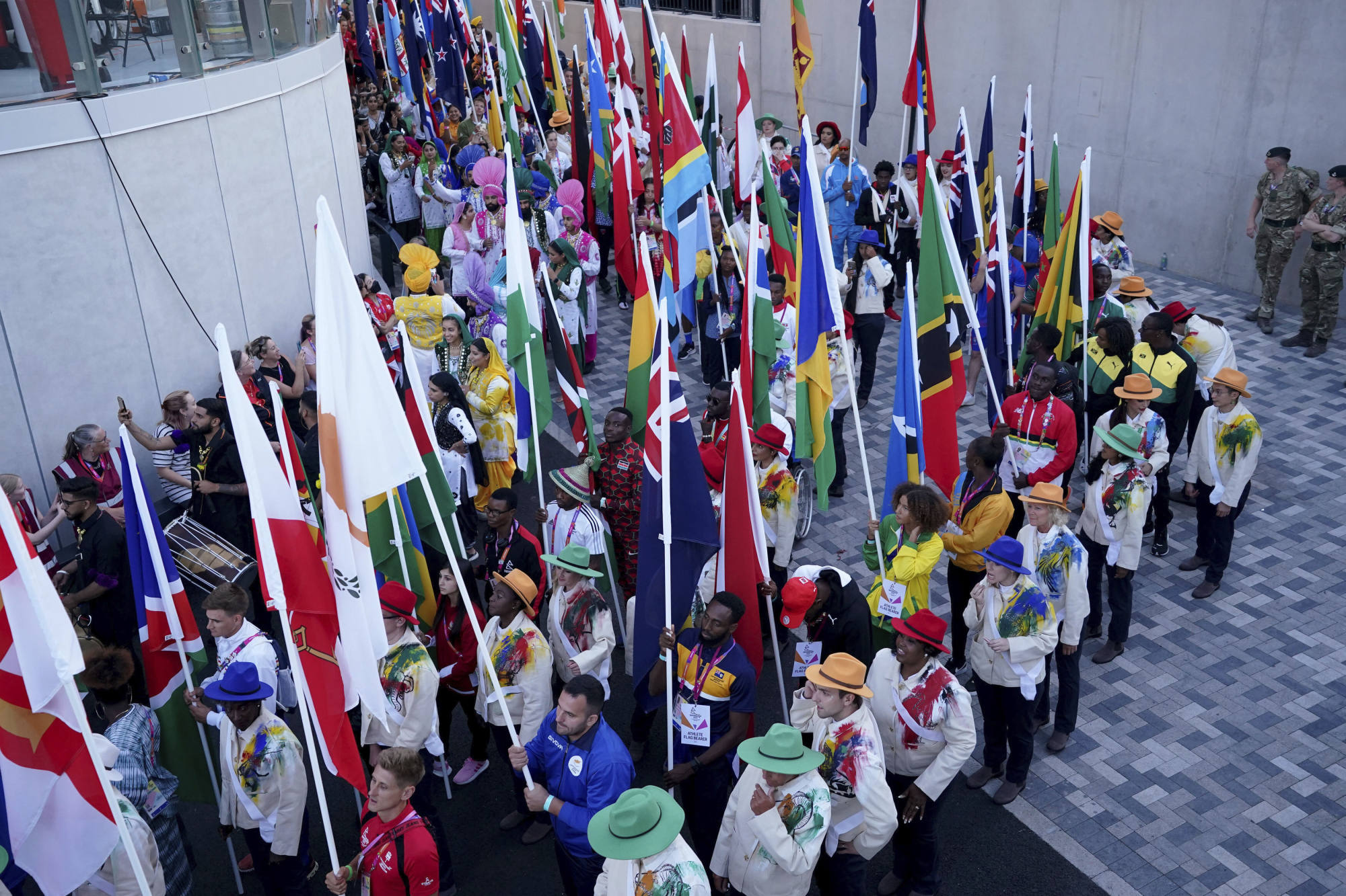 Competing nations and their flagbearers wait to enter the show during the Closing Ceremony for the Commonwealth Games. Photo: AP