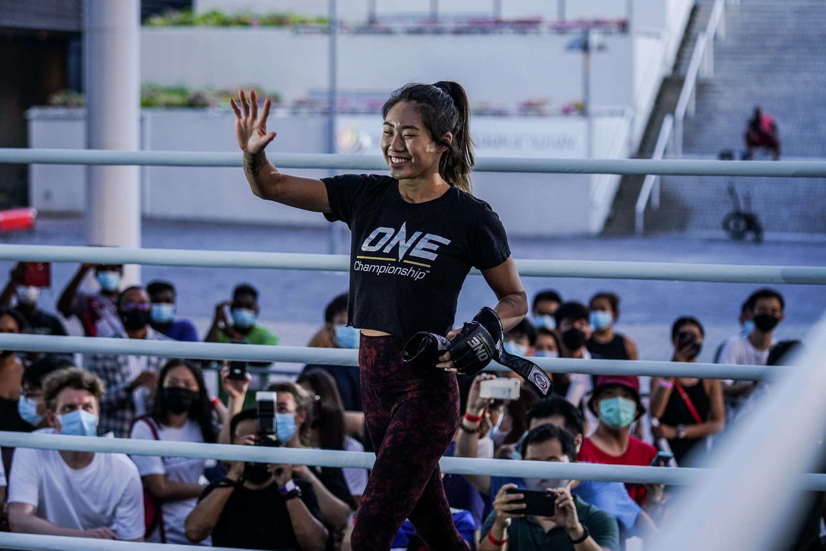 ONE atomweight champion Angela Lee addresses fans and media at the ONE X open workouts in Singapore. Photo: ONE Championship