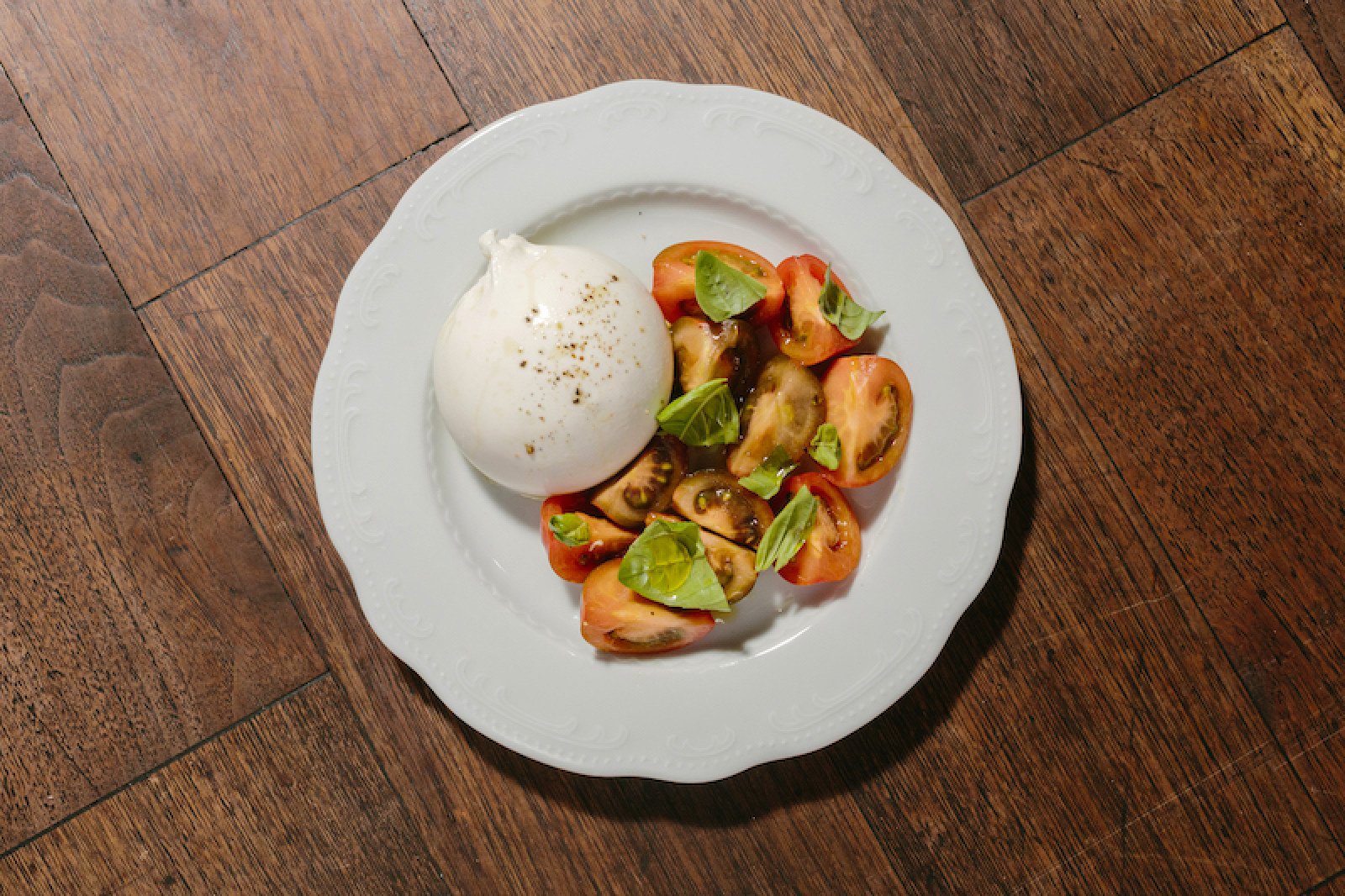 Burrata with camone tomatoes at Ramato. Photo: Ramato