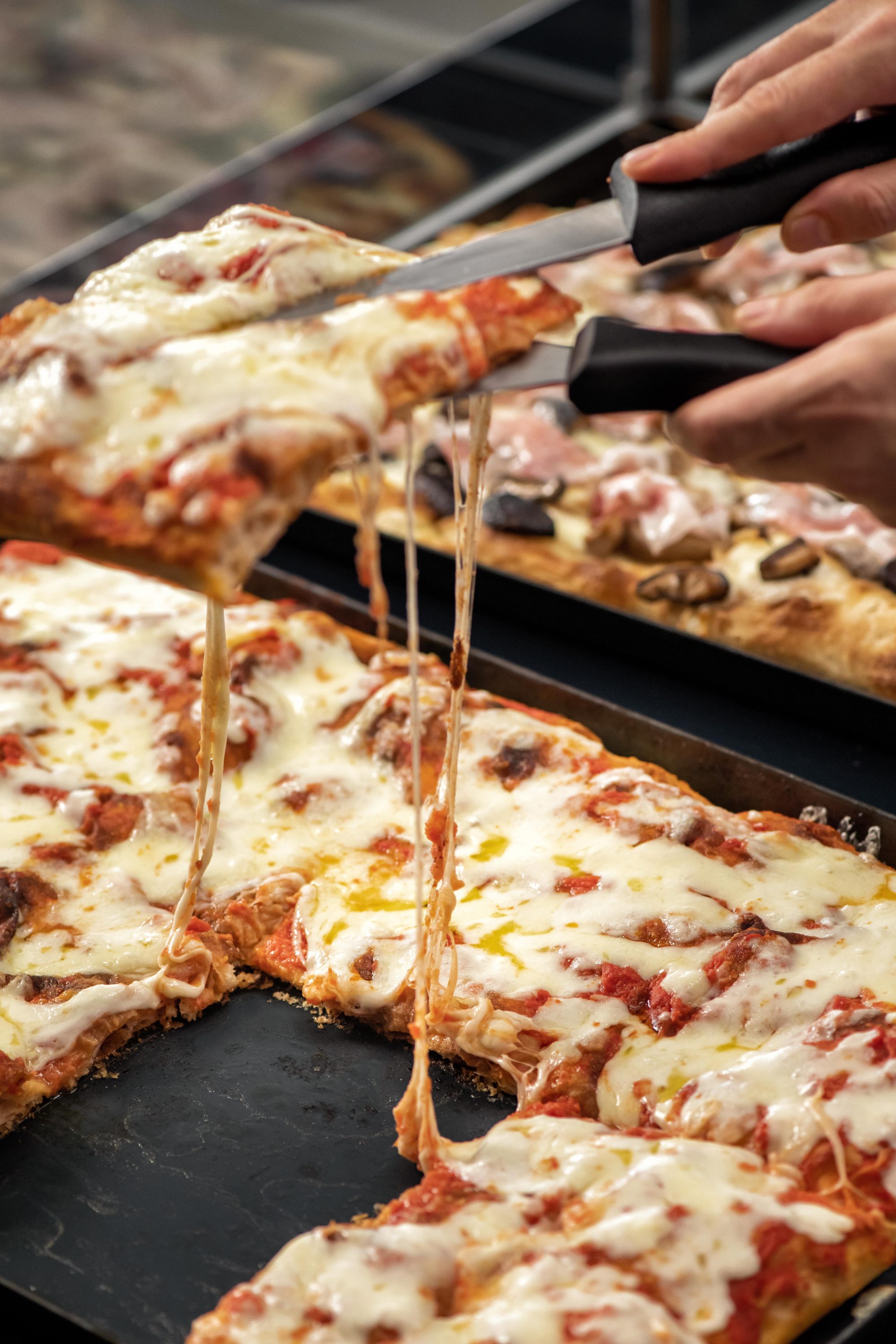 Roman-style pizza served by the slice at Bluhouse. Photo: Bluhouse