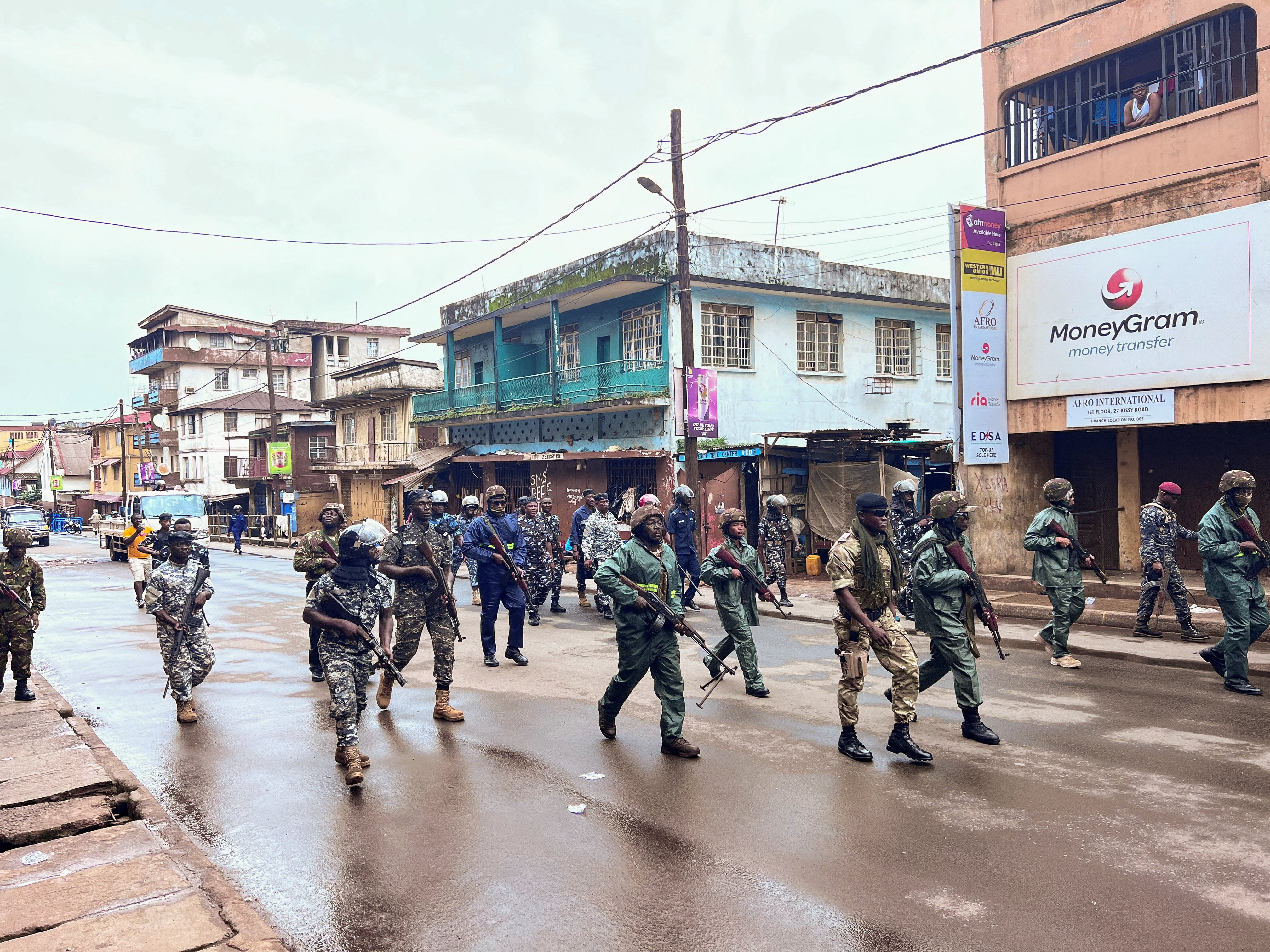 Riot police patrol in Freetown, Sierra Leone during anti-government protests on Wednesday. Photo: Reuters