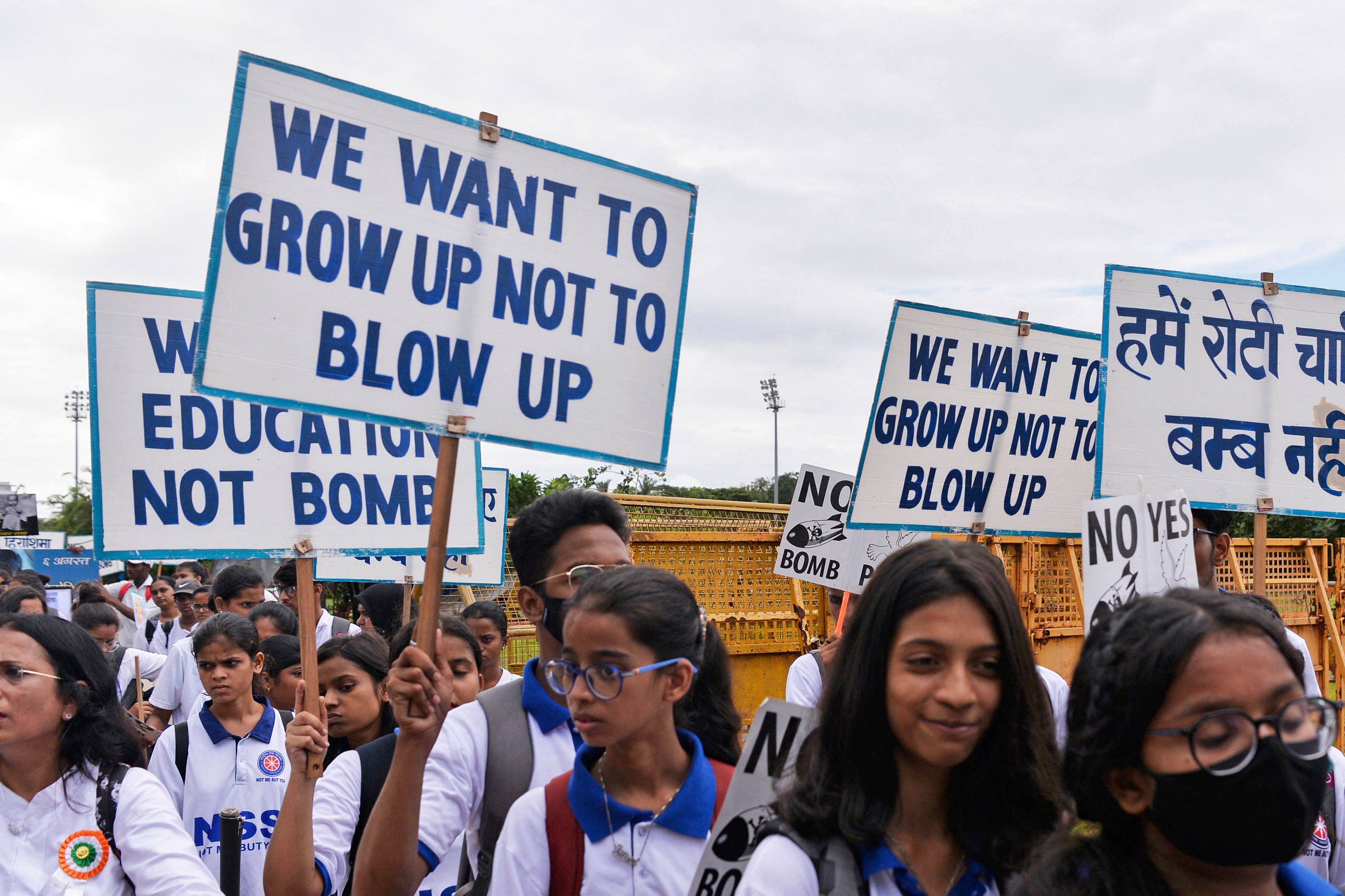 Students in Mumbai, India, hold placards at a peace rally on August 6 to mark the 77th anniversary of the atomic bombing of Hiroshima. Photo: AFP