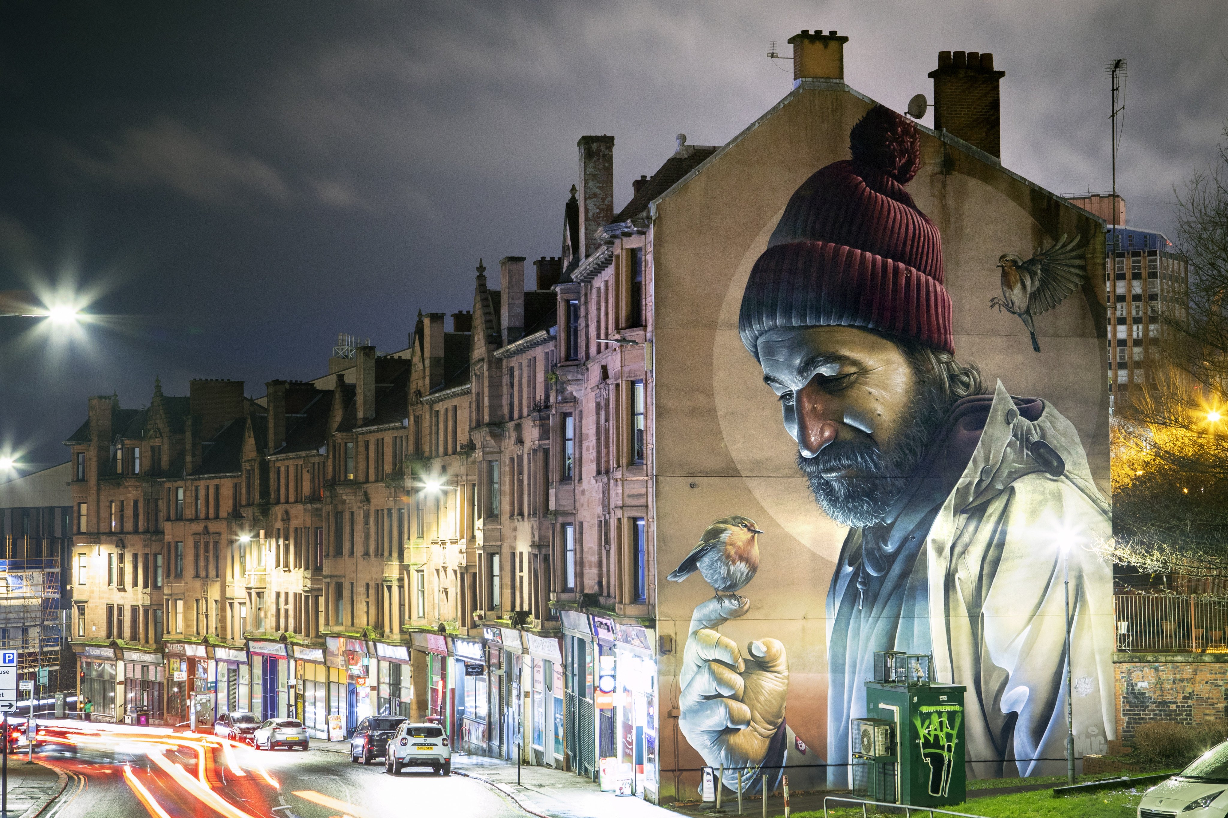 One of Glasgow’s best-know murals, by street artist Smug, depicts a modern-day St Mungo, its patron saint and founder. Street art has proliferated in the Scottish city. Photo: Getty Images