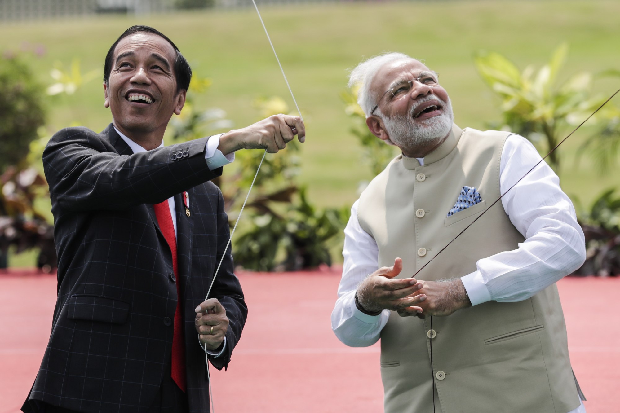 As India prepares for 75th Independence Day, scooter riders and