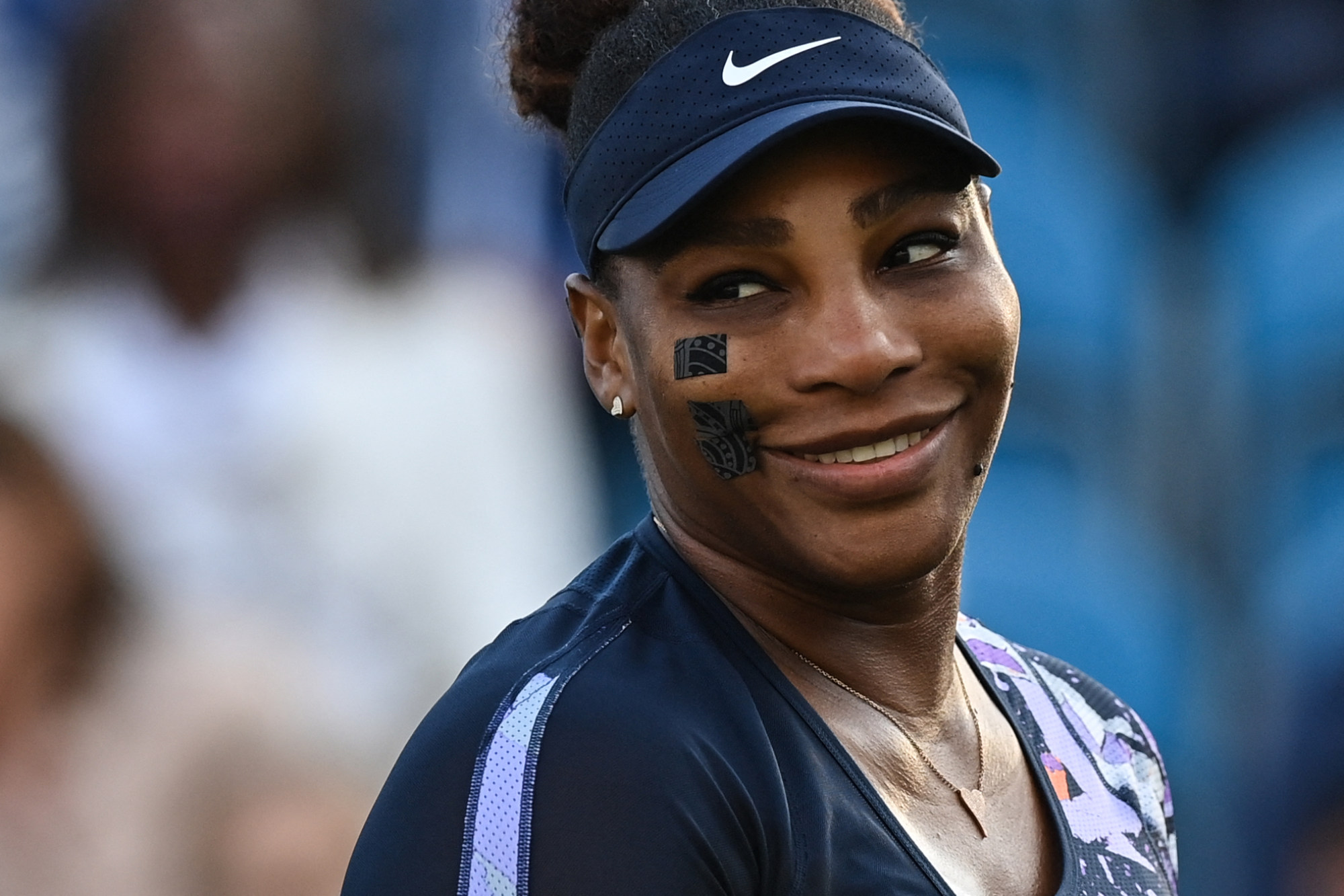 Serena Williams reacts as she plays with Tunisia’s Ons Jabeur against Spain’s Sara Sorribes Tormo and Czech Republic’s Marie Bouzkova during their women’s doubles tennis match, on day three of the Eastbourne International tennis tournament in Eastbourne, southern England, on June 21. Photo: AFP
