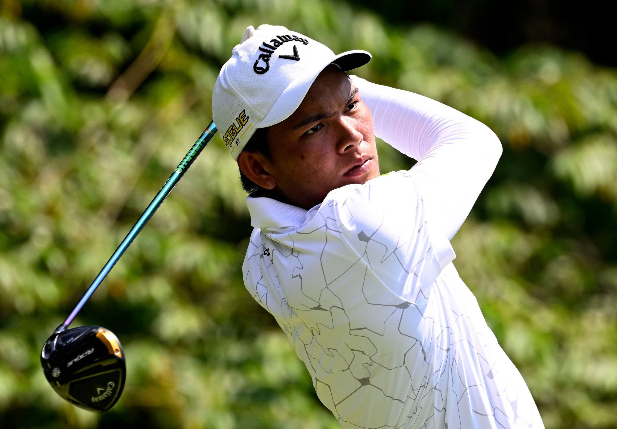 Phachara Khongwatmai of Thailand plays a shot during the International Series Singapore golf tournament at Tanah Merah Country Club in Singapore. Photo: AFP