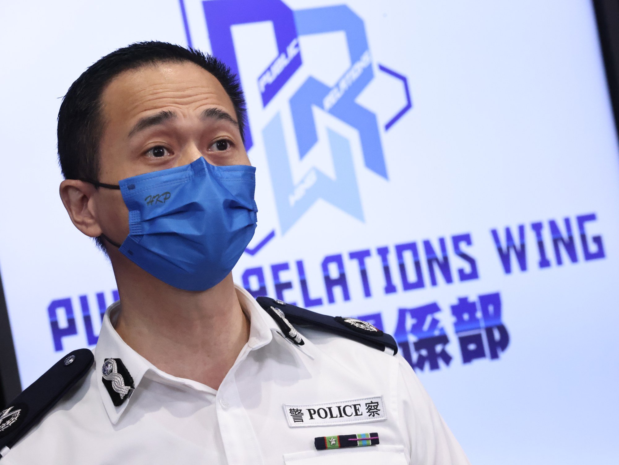 Assistant Commissioner of Police Joe Chan, the new head of the force’s public relations wing, meets the press at Police Headquarters in Wan Chai. Photo: K. Y. Cheng