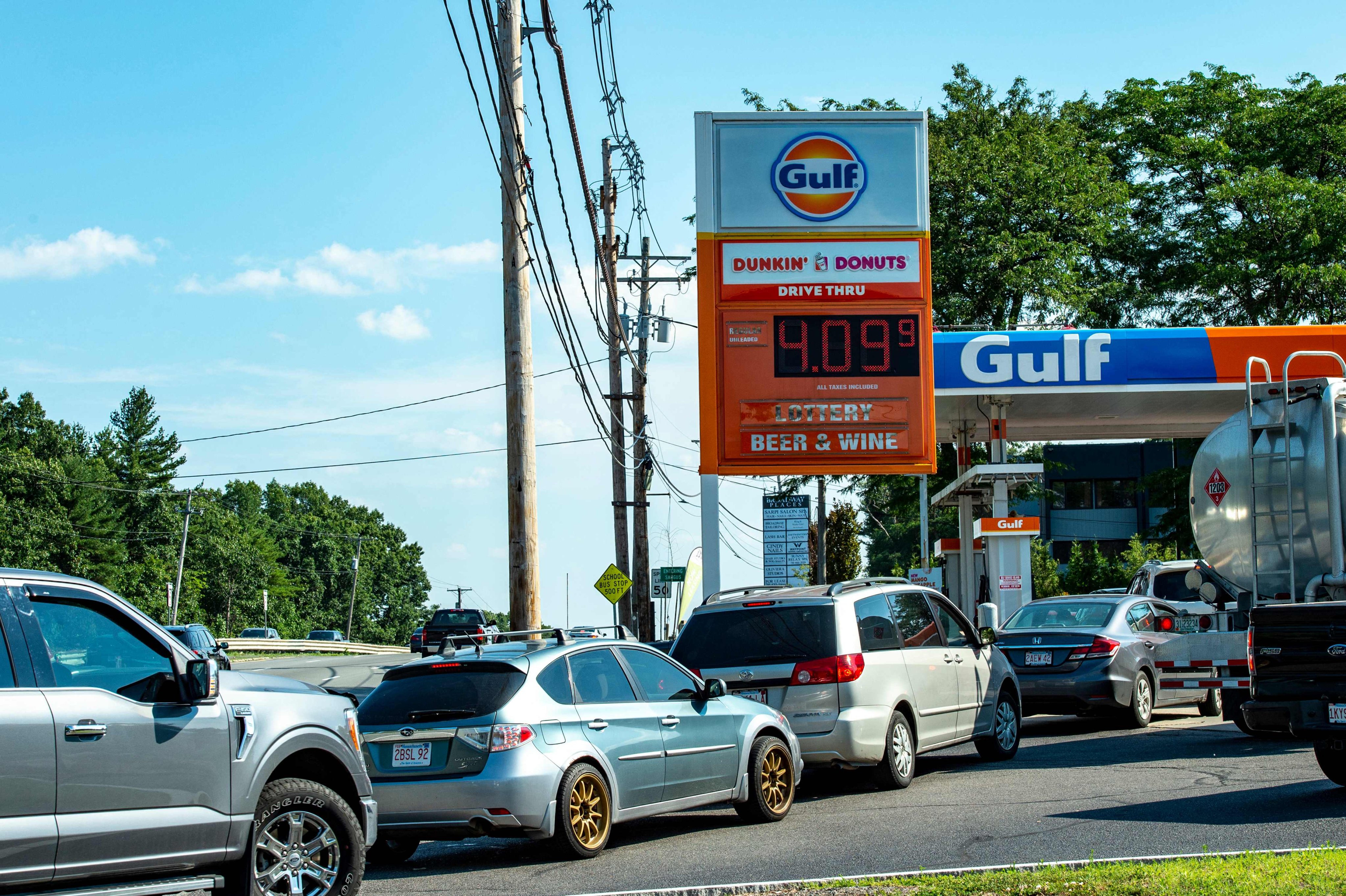 Drivers queue outside a petrol station in Lynnfield, Massachusetts, on July 19. Lower petrol prices were the primary driver of unchanged US headline inflation in July as compared to June, but the annualised rate was still 8.5 per cent. Photo: AFP