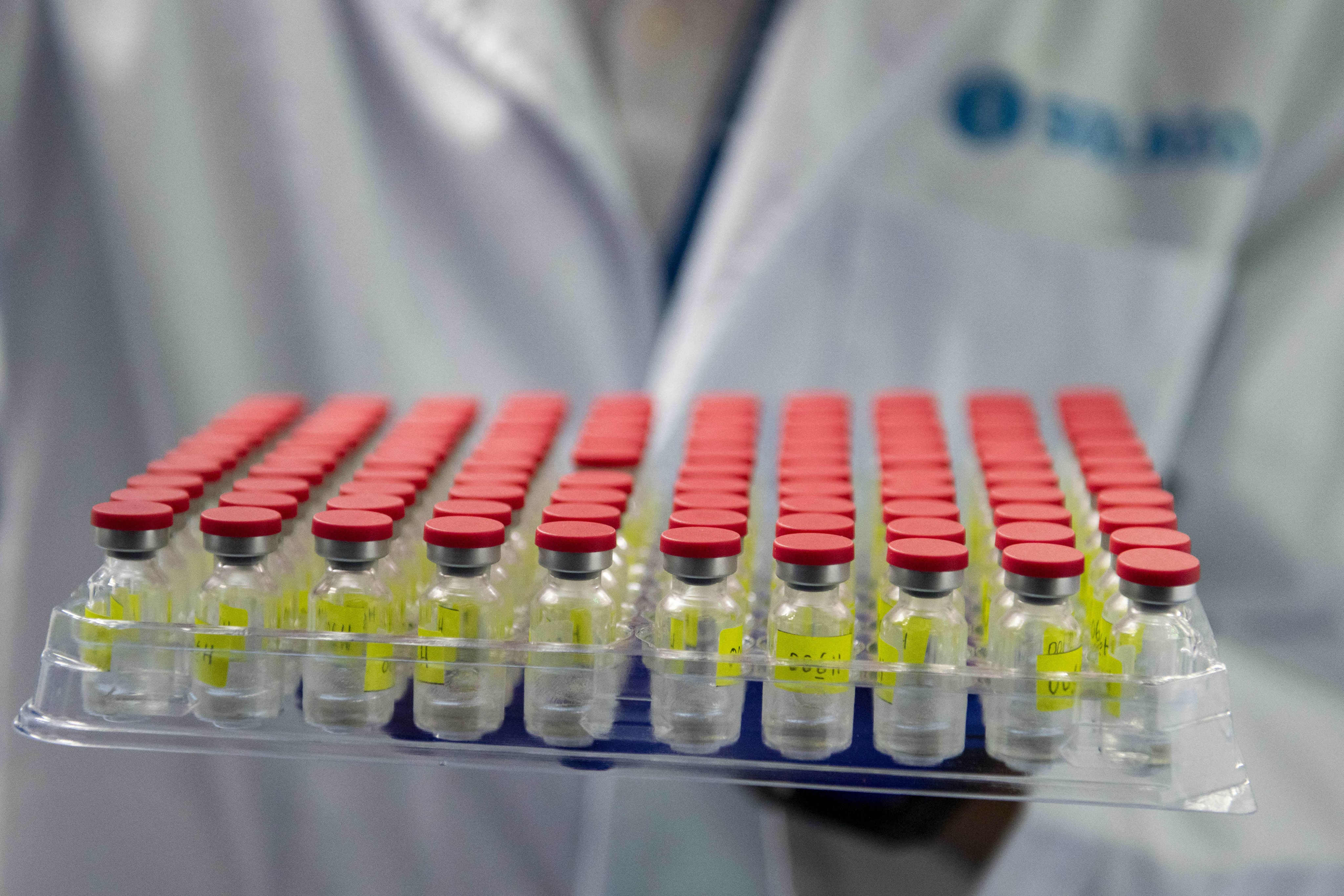 A technician works during a test run of the fill-and-finish process for CanSino vaccines at a Solution Biologics factory in Kuala Lumpur, Malaysia, on September 8, 2021. Photo: Xinhua