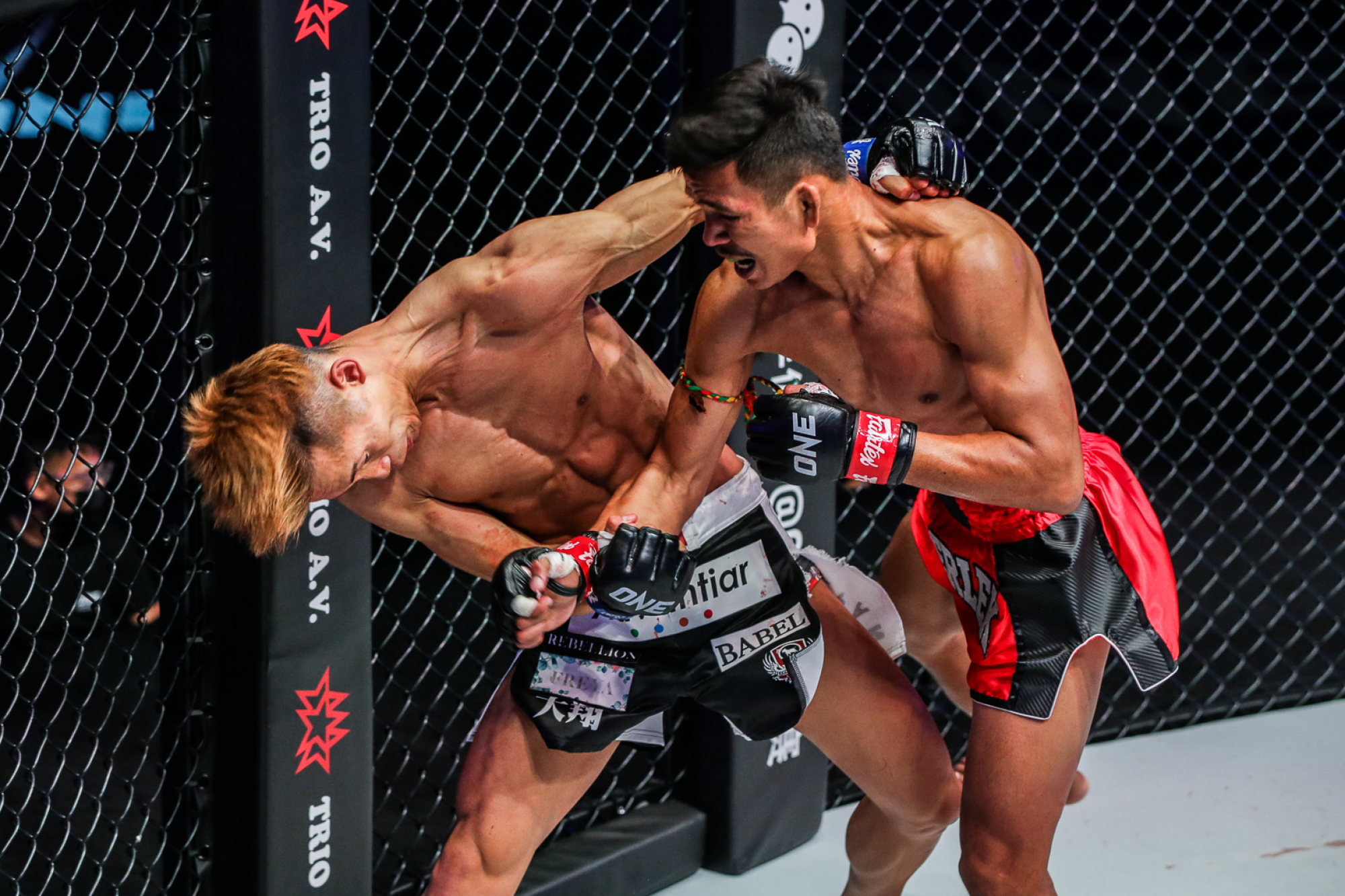 Superlek lands a punch on Taiki Naito at ONE 157.