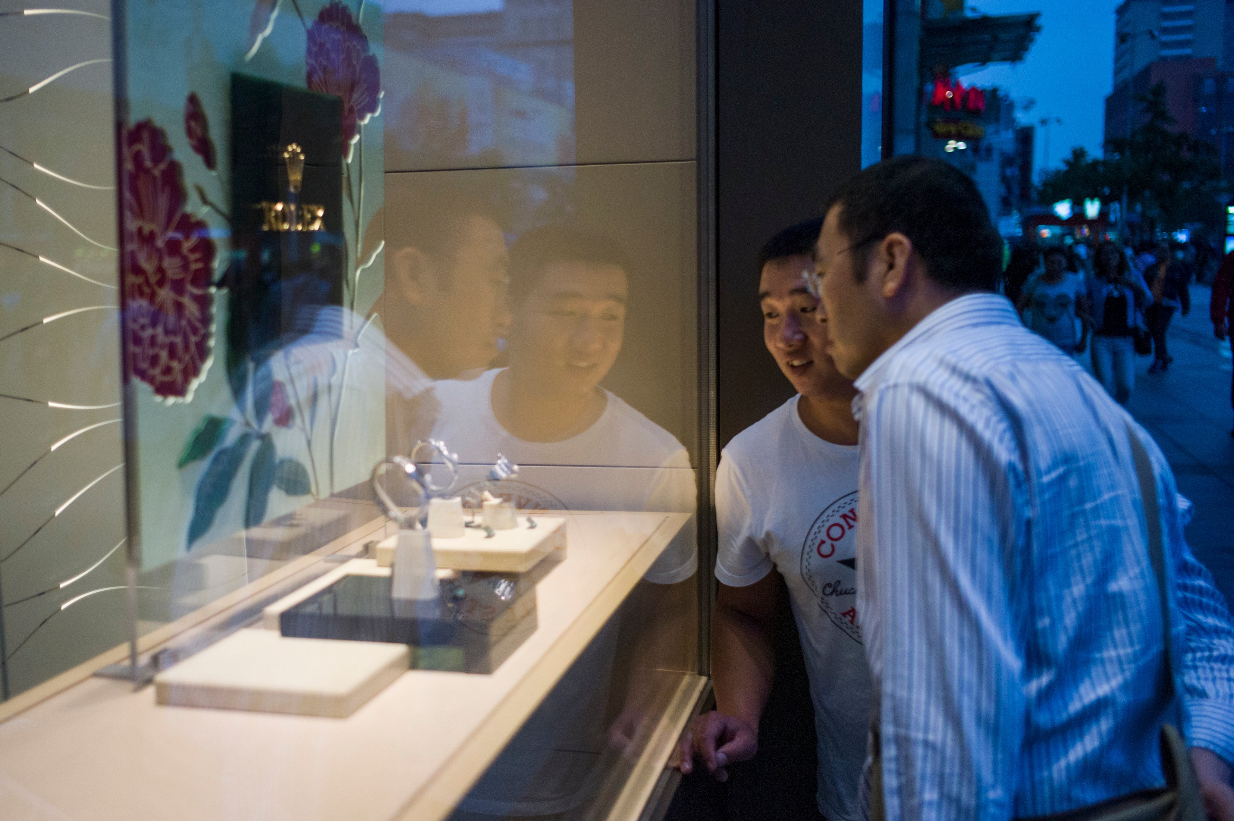 Cash is king in an unstable economy, and wealthier Chinese are selling their pre-owned luxury goods, such as Rolex watches, to make a quick buck. Photo: AFP