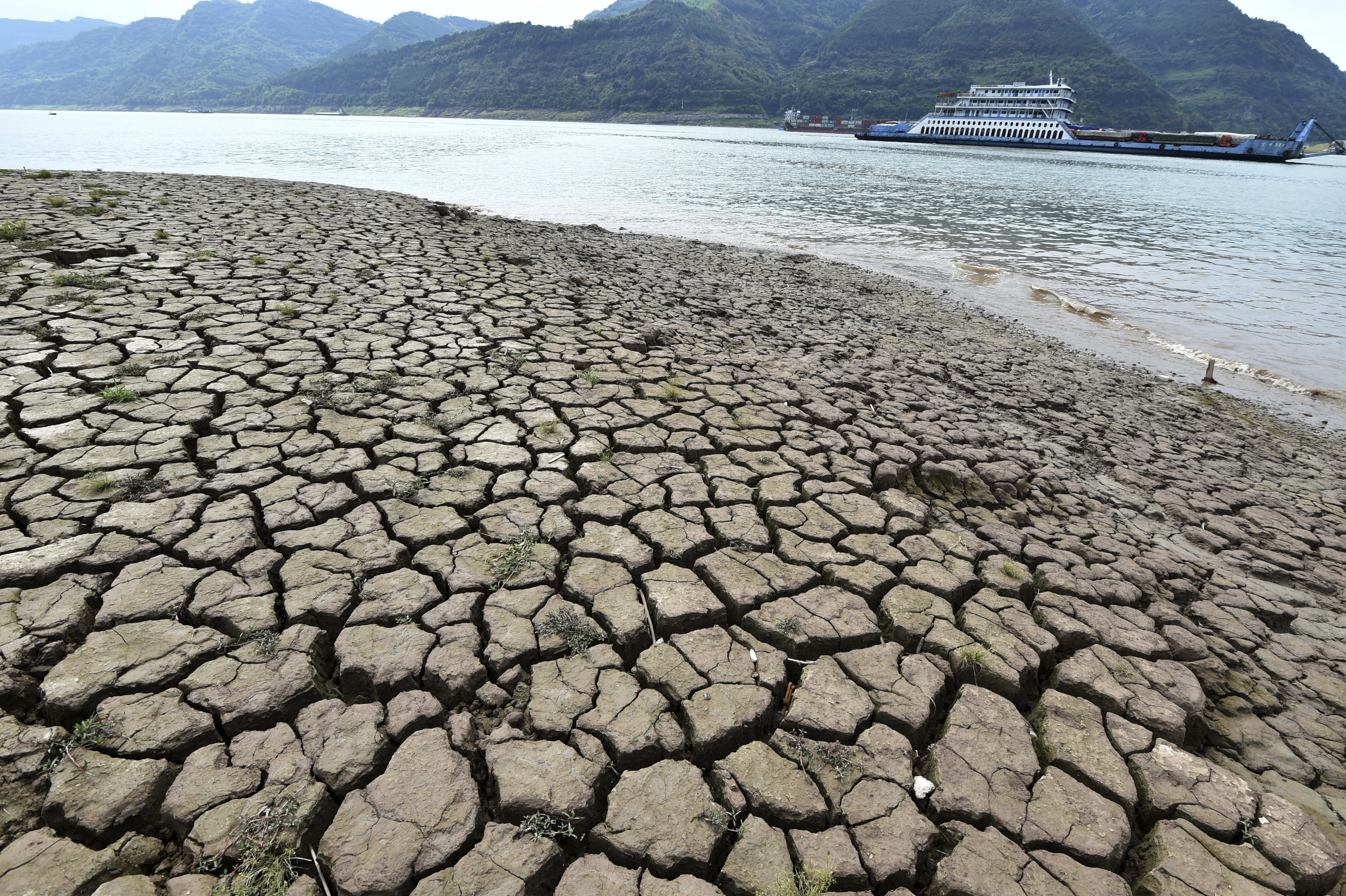 Continuous high temperatures have restricted water from the Yangtze River, with water flows into hydropower reservoirs having dropped by 50 per cent this month. Photo: AP