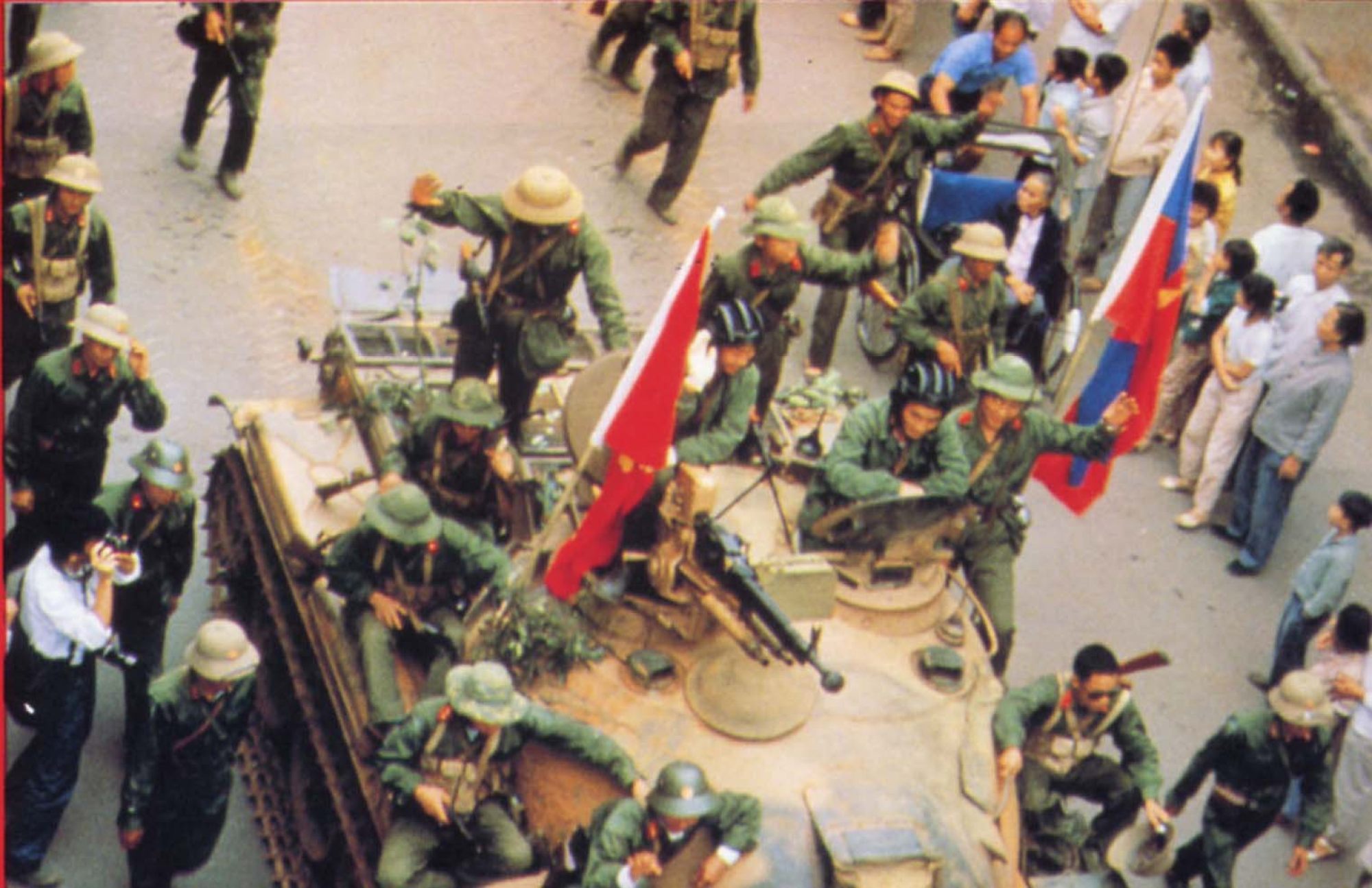 A still from Boat People showing Vietnamese military personnel in the streets.