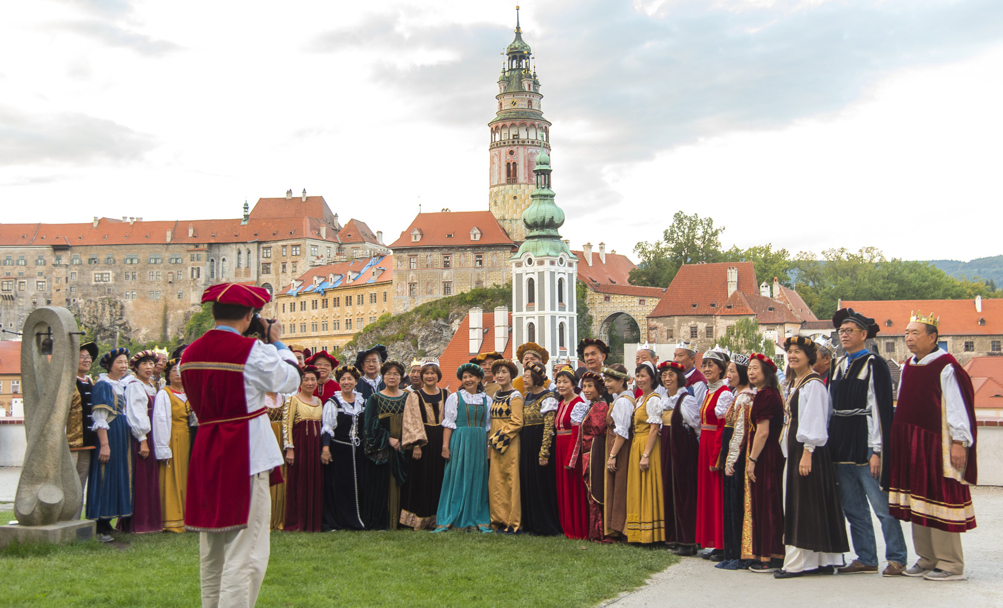 Chinese tourists dress up in traditional garb in Cesky Krumlov’s old town. Photo: Tim Pile