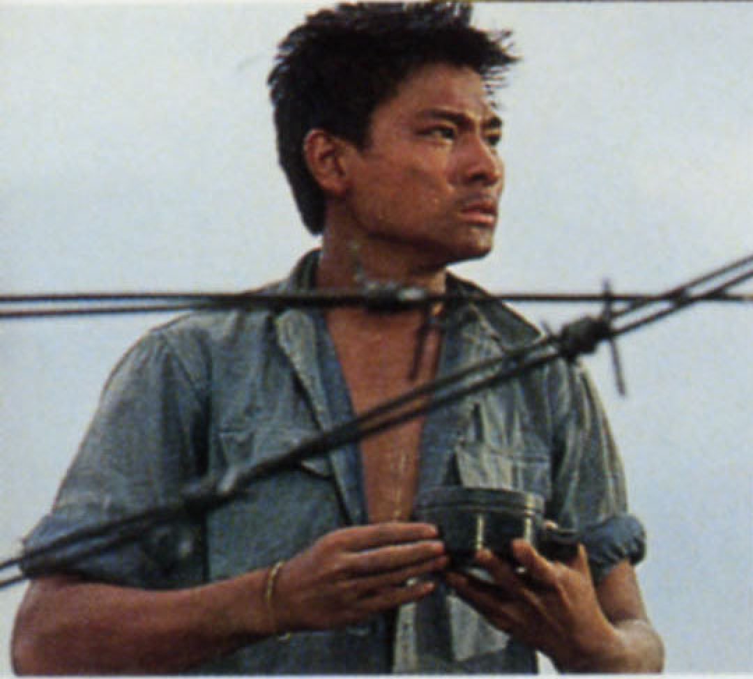 Andy Lau as To Minh in a still from Boat People.