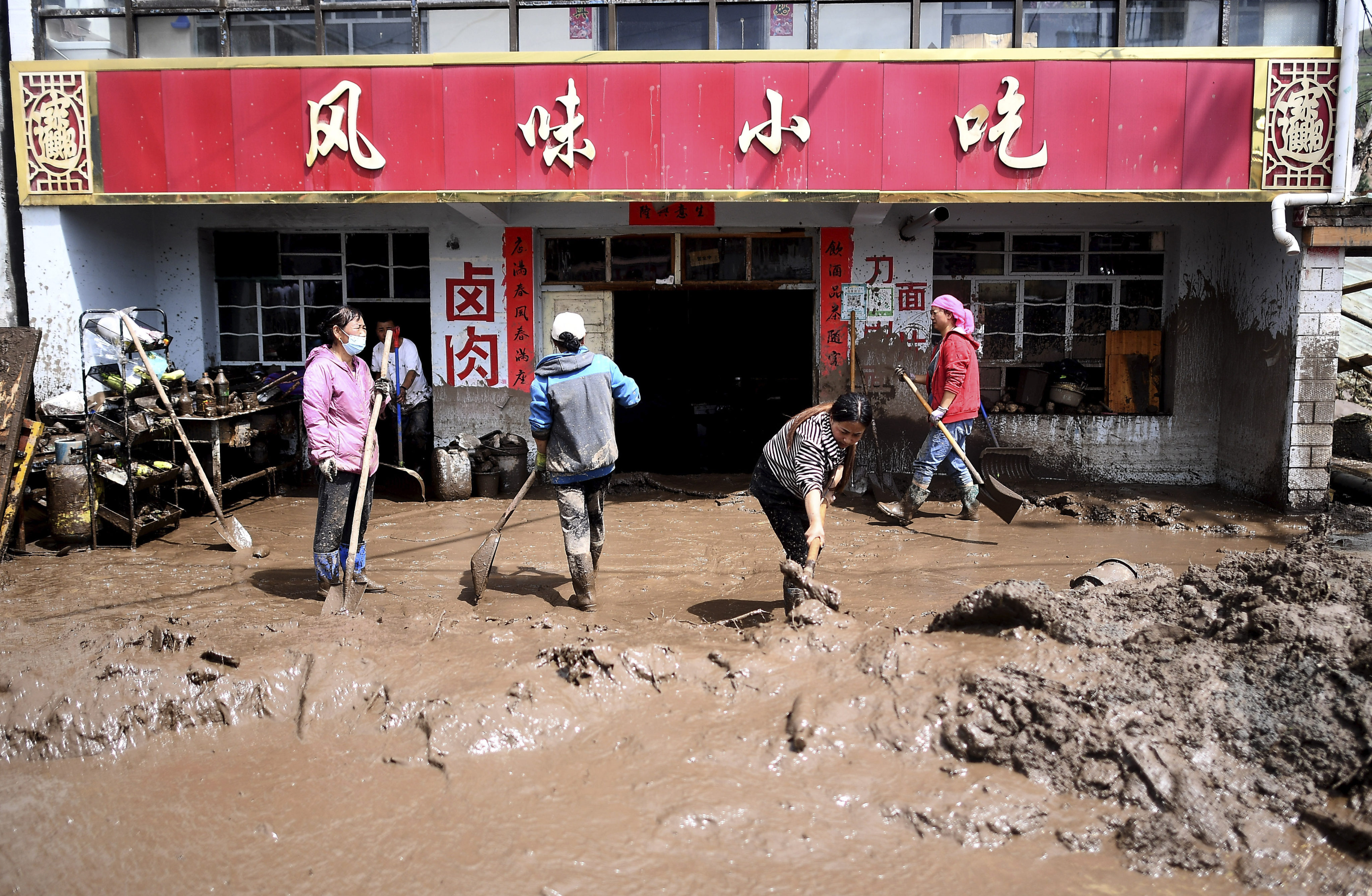 Heavy rain started in Datong county in Qinghai province in northwestern China on Wednesday and by Thursday at least 16 people were reported dead and dozens were missing. Photo: Xinhua via AP