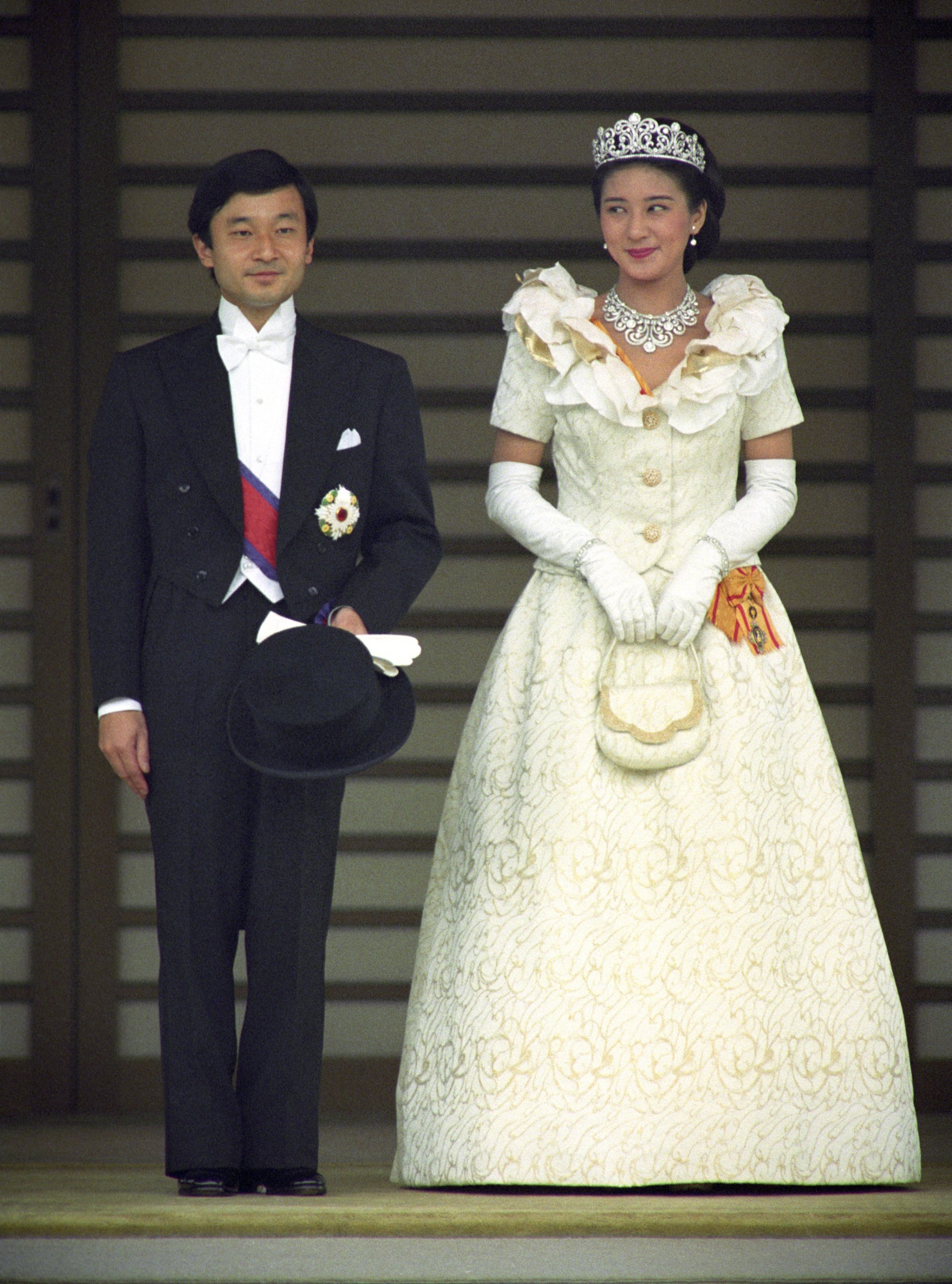 Japanese Crown Prince Naruhito and Crown Princess Masako on their wedding day after an audience with the emperor and empress at the Imperial Palace in Tokyo, in 1993. Photo: Kyodo News Stills via Getty Images)