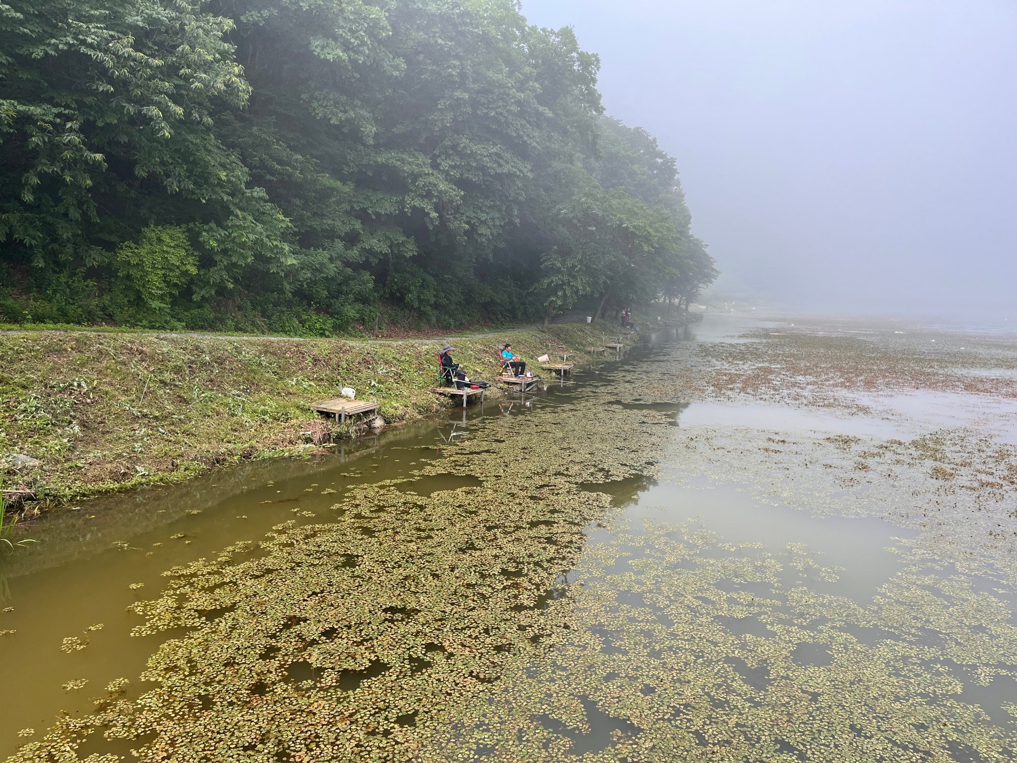 South Korean fishermen relaxing close to the DMZ and a few kilometres away from North Korea. Photo: Matthew C. Crawford