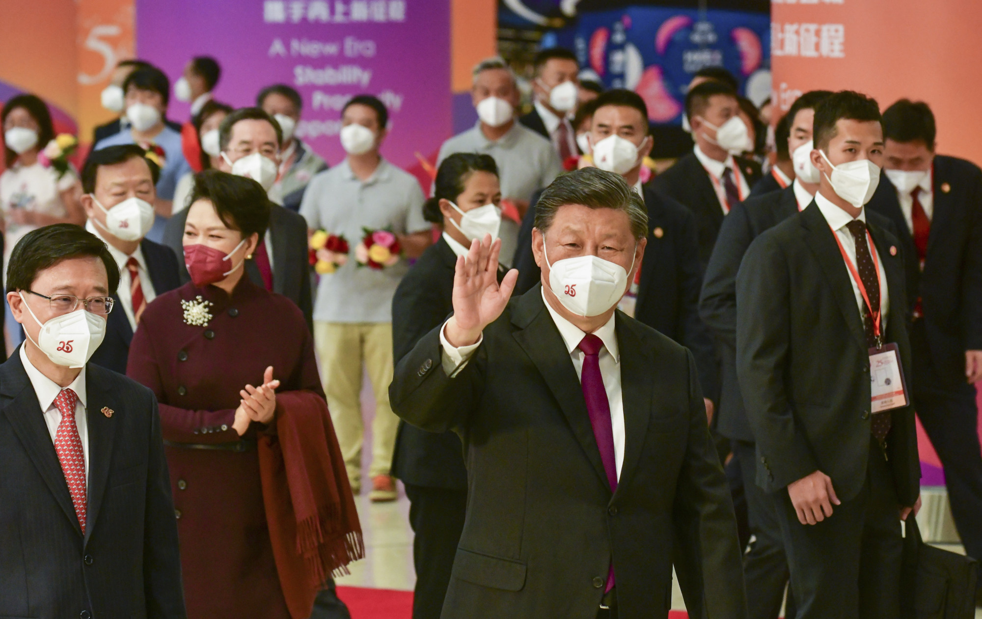 President Xi Jinping (third left) and his wife Peng Liyuan (second left) during their visit in Hong Kong in July. Photo: ISD