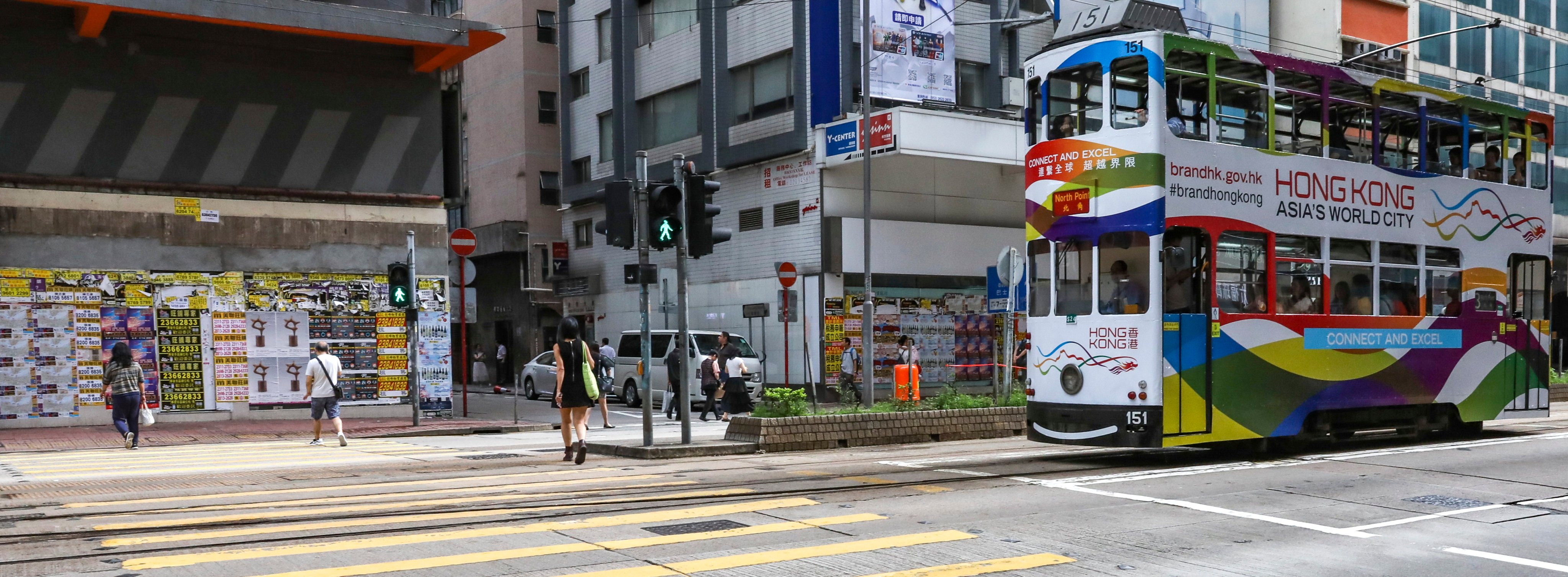 A tram bears the logo “Hong Kong - Asia’s World City”. Photo: SCMP / Nora Tam