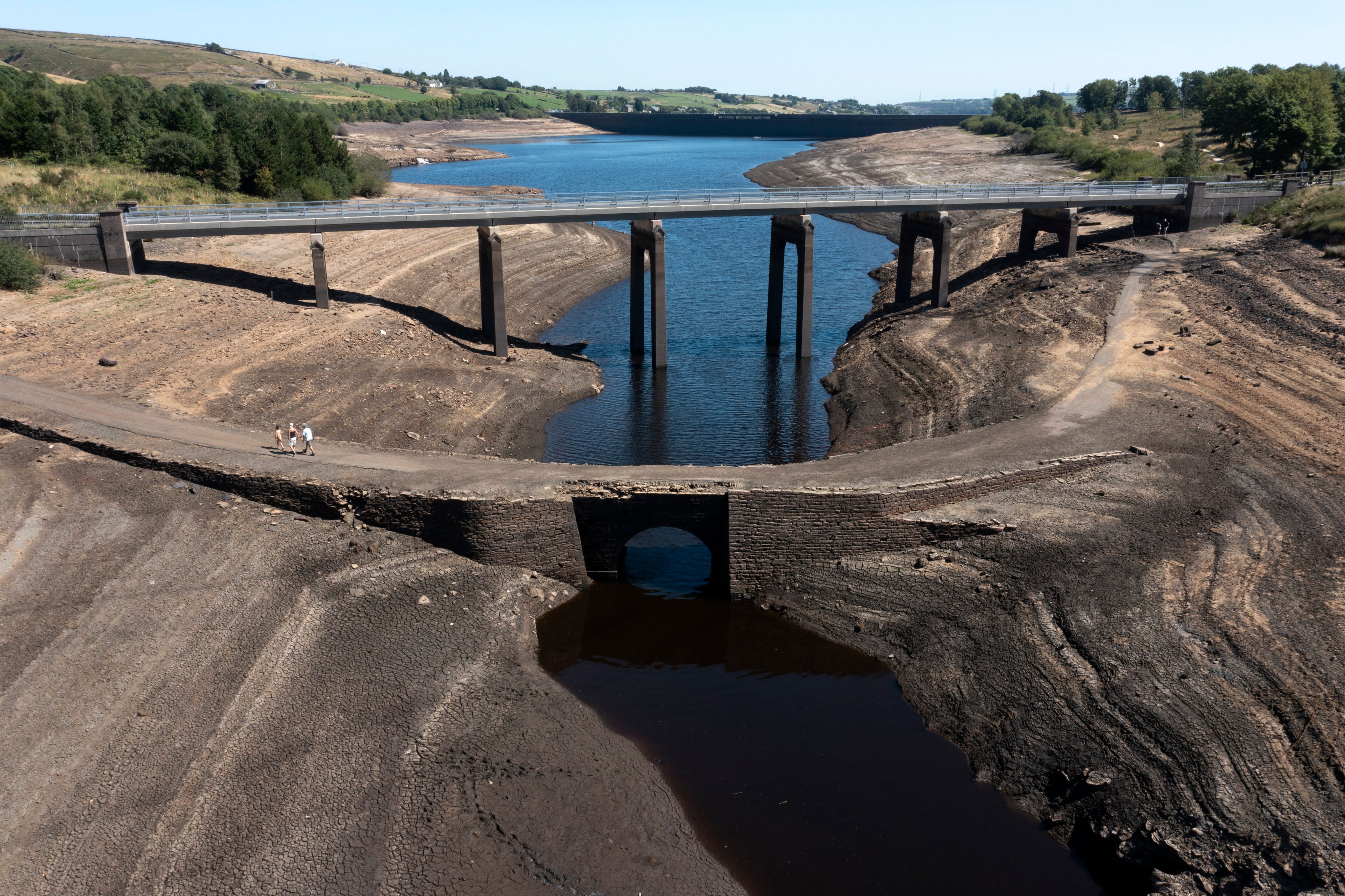 Low water levels at the Baitings Reservoir in Yorkshire, England, have revealed the remains of an ancient road. Photo: AP