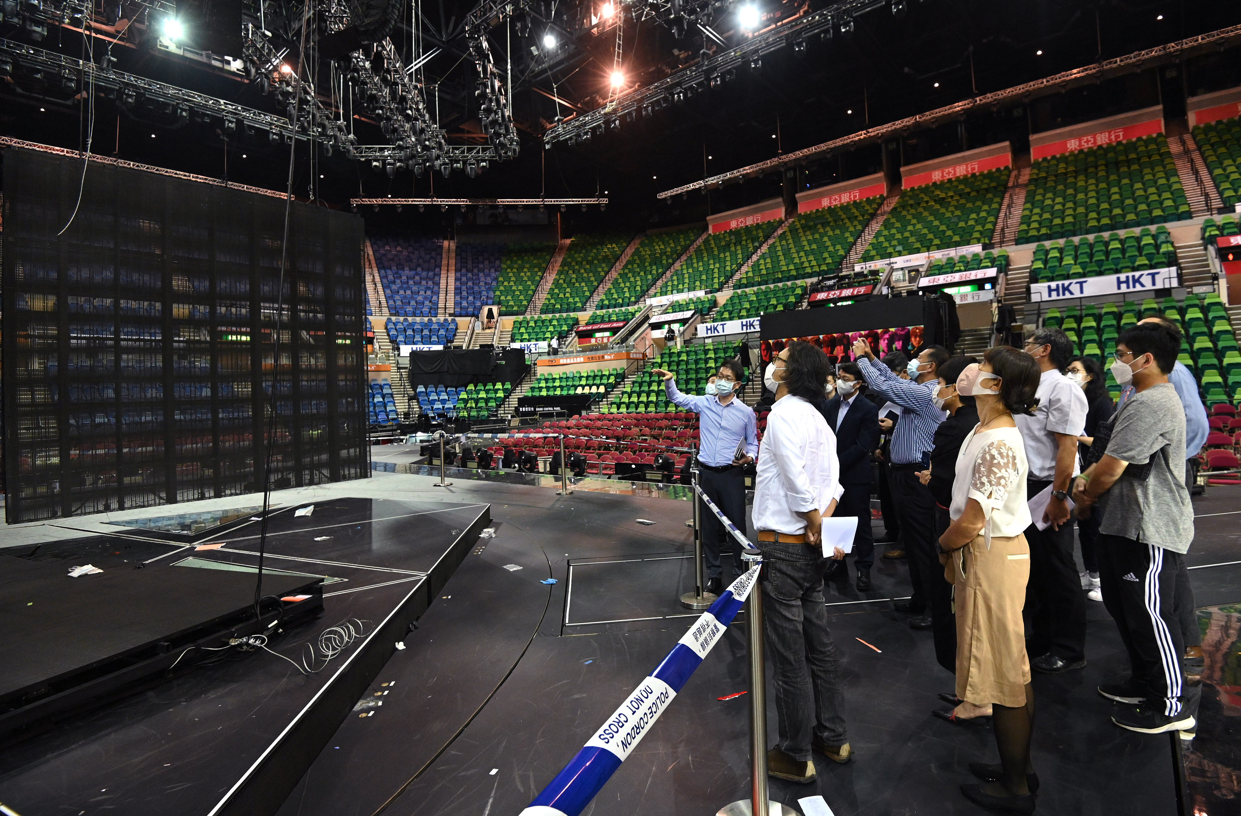 Task force members inspect the stage set-up in question at the Hong Kong Coliseum. Photo: Handout
