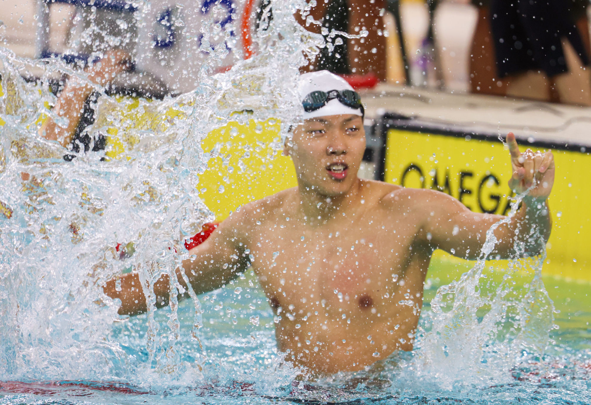 Hayden Kwan celebrates his city record in the 100m backstroke at Victoria Park. Photo: Dickson Lee