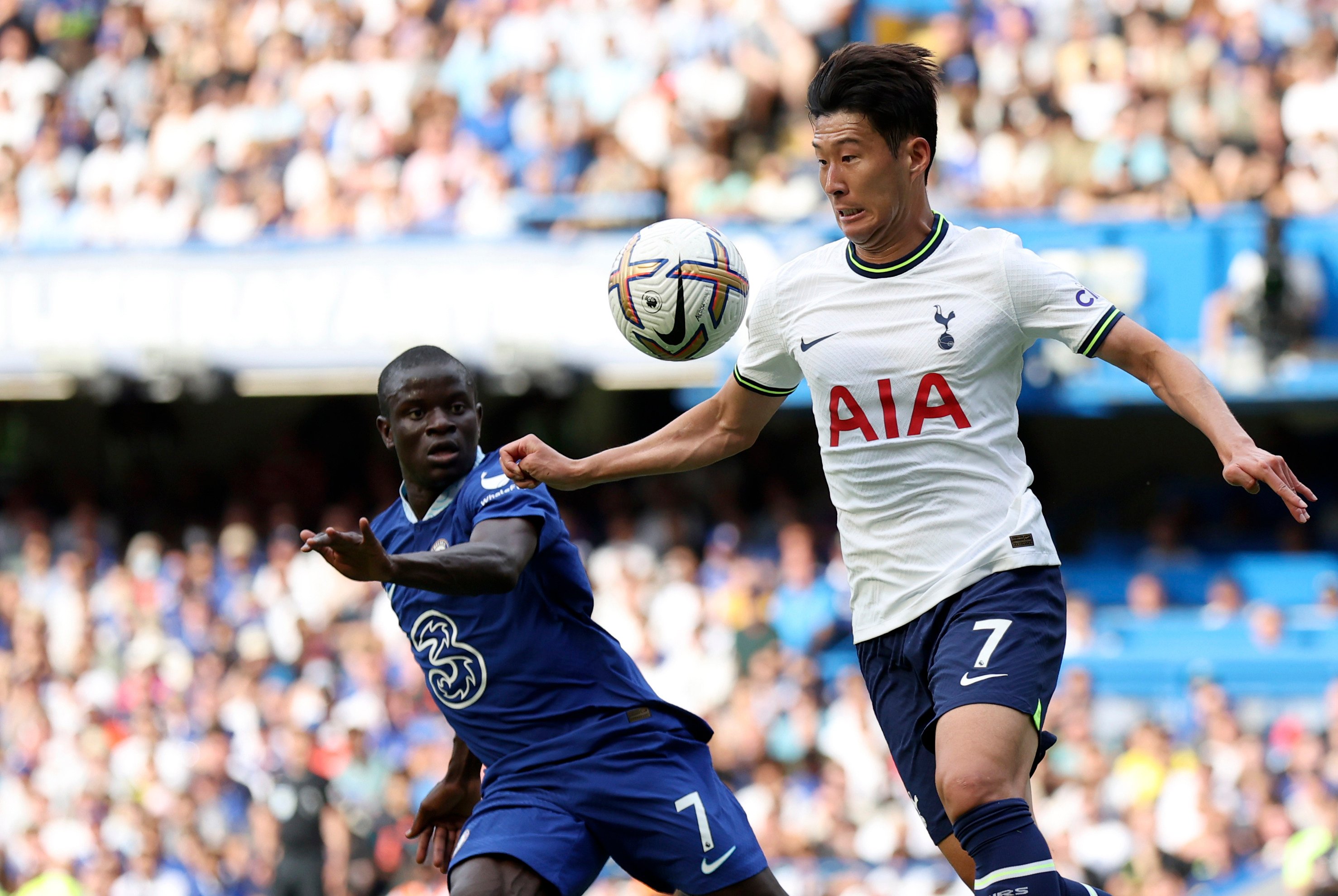 Tottenham’s Son Heung-min (right) duels for the ball with Chelsea’s N’Golo Kante. Photo: AP